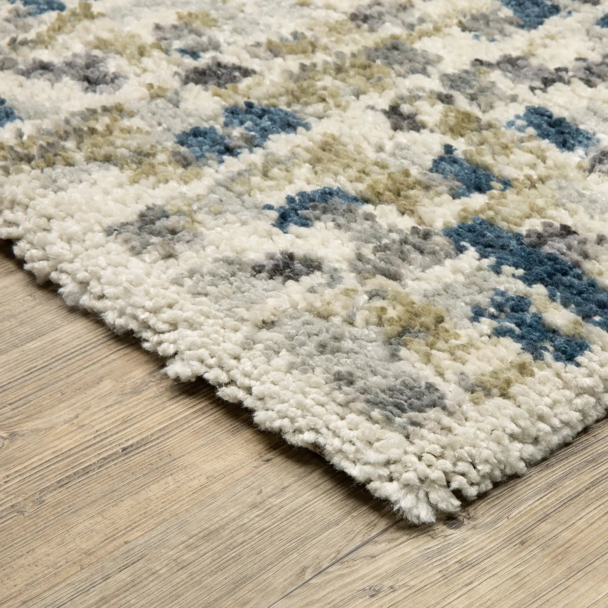Aspen 3514A Ivory/ Blue Area Rug by Oriental Weavers