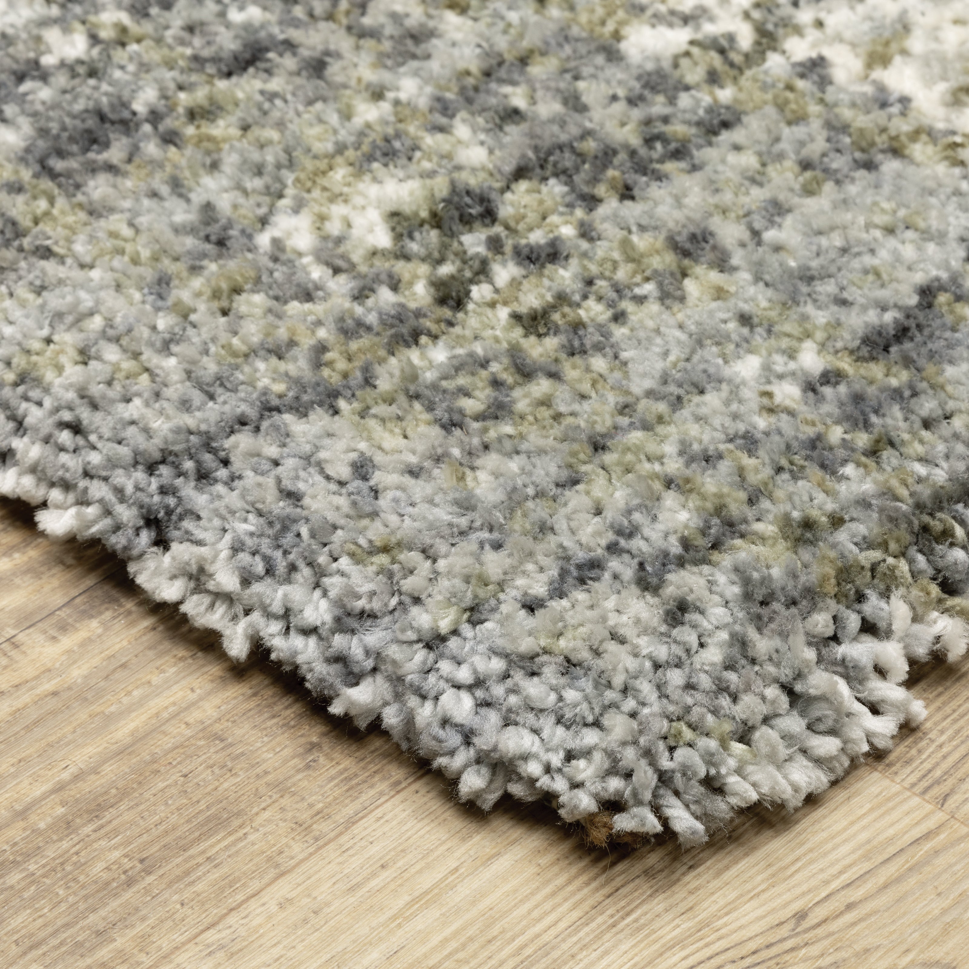 Oriental Weavers Aspen 530J9 plush shag rug featuring abstract pattern in grey/ ivory tones