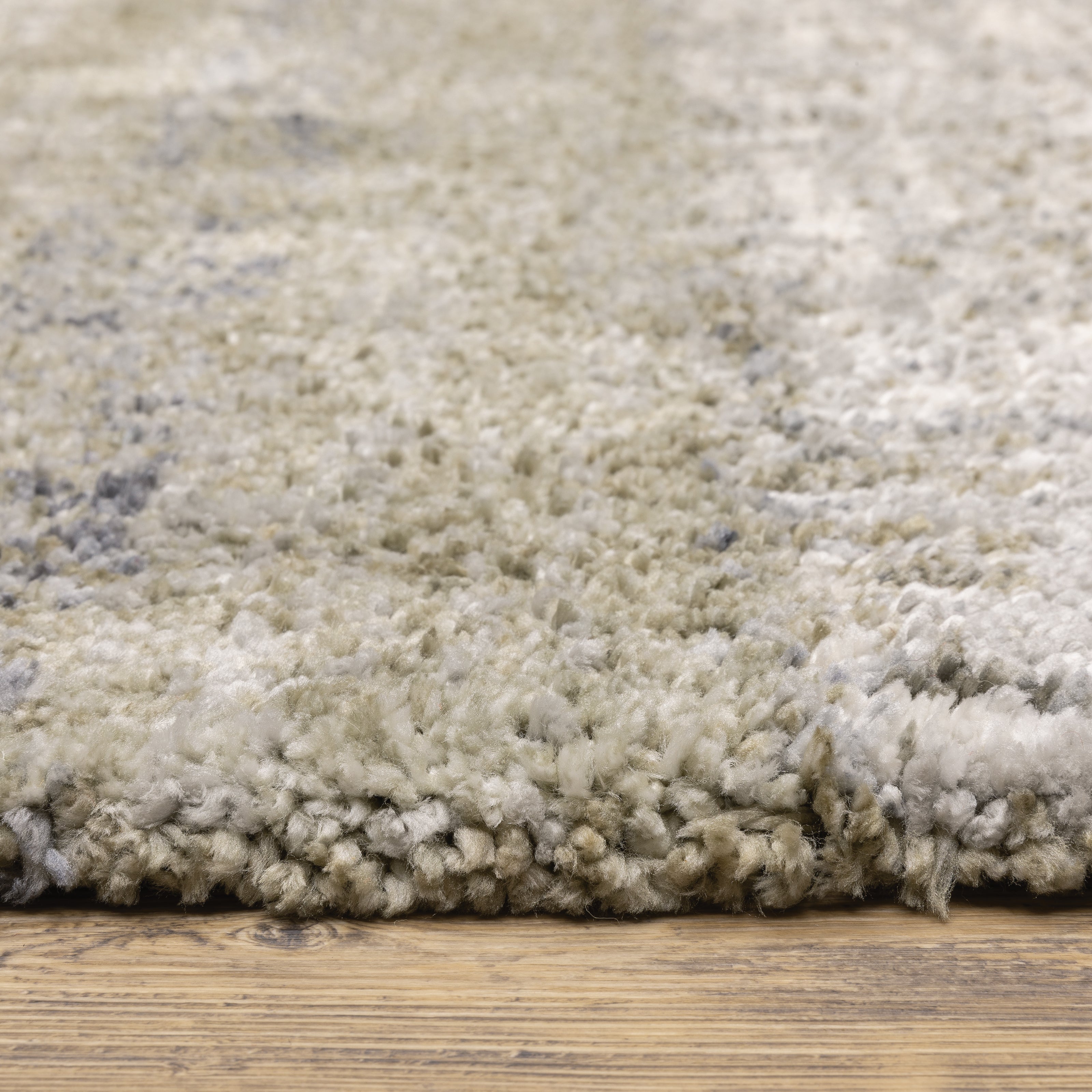 Oriental Weavers Aspen 530J9 plush shag rug featuring abstract pattern in grey/ ivory tones