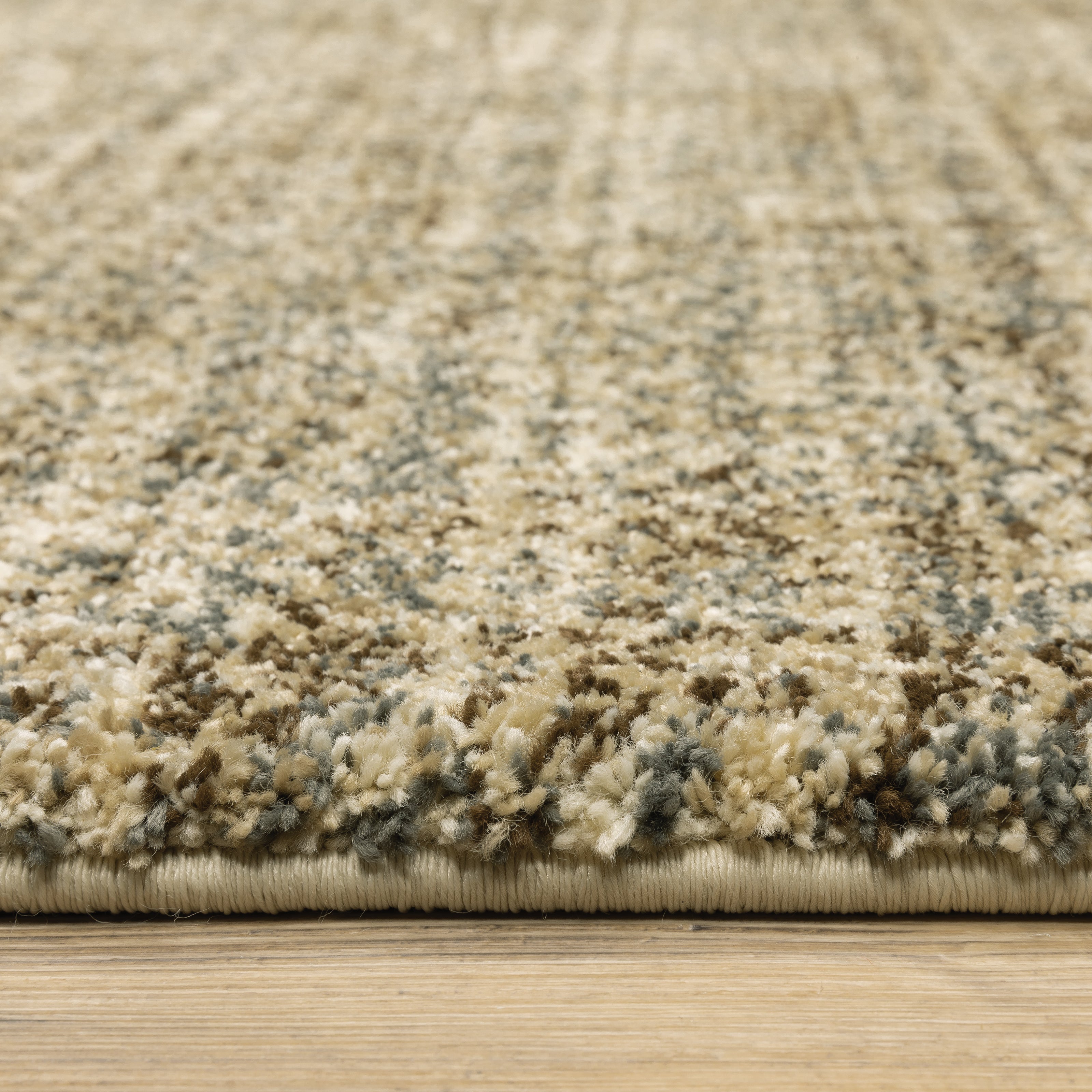 Oriental Weavers Astor 1449M plush modern rug featuring abstract pattern in beige/ brown tones