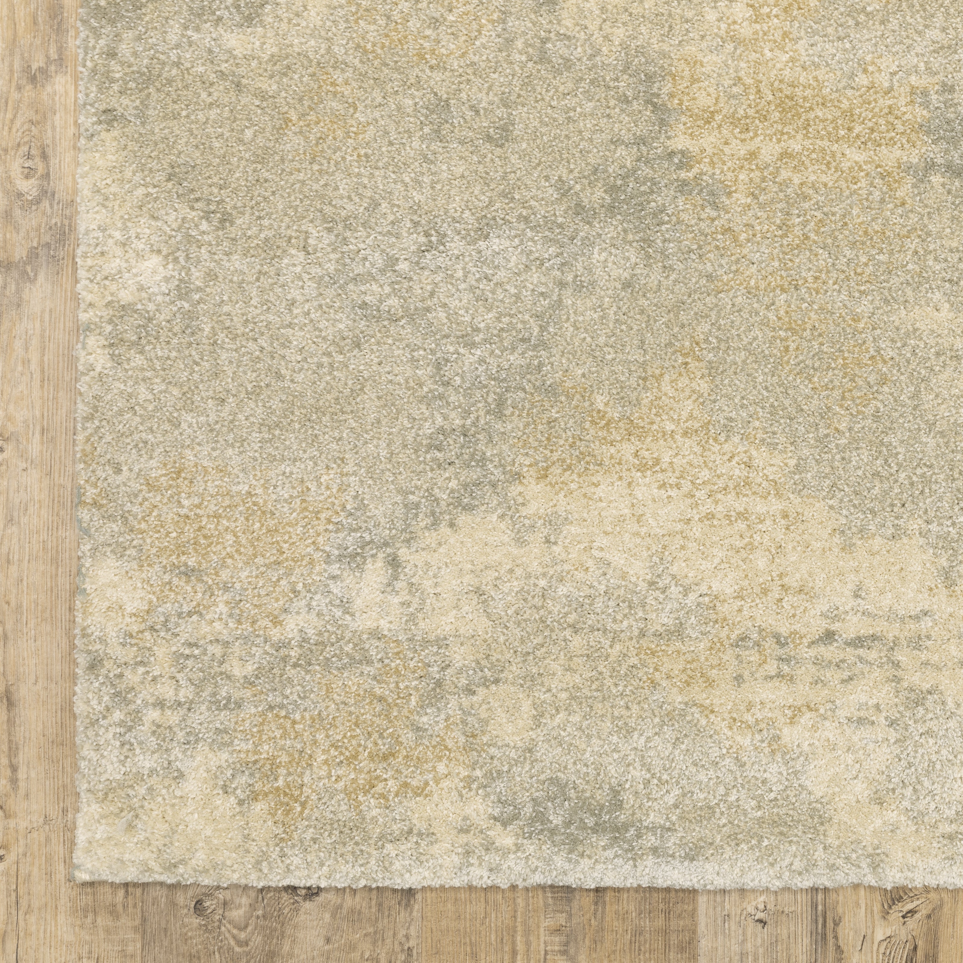 Oriental Weavers Astor 2268J plush modern rug featuring abstract pattern in beige/ grey tones