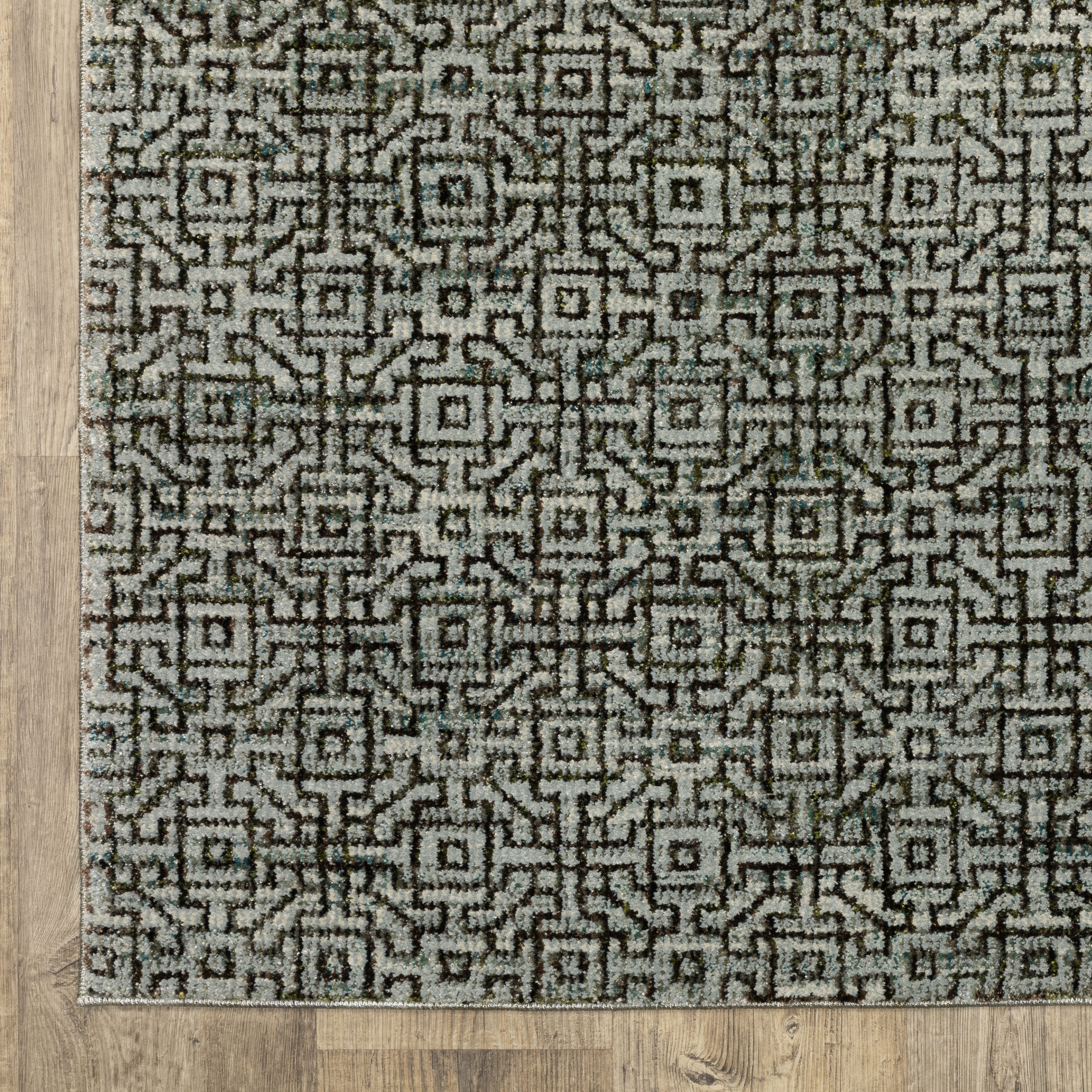 Oriental Weavers Atlas 3721J textured area rug featuring textured design in blue/ brown tones