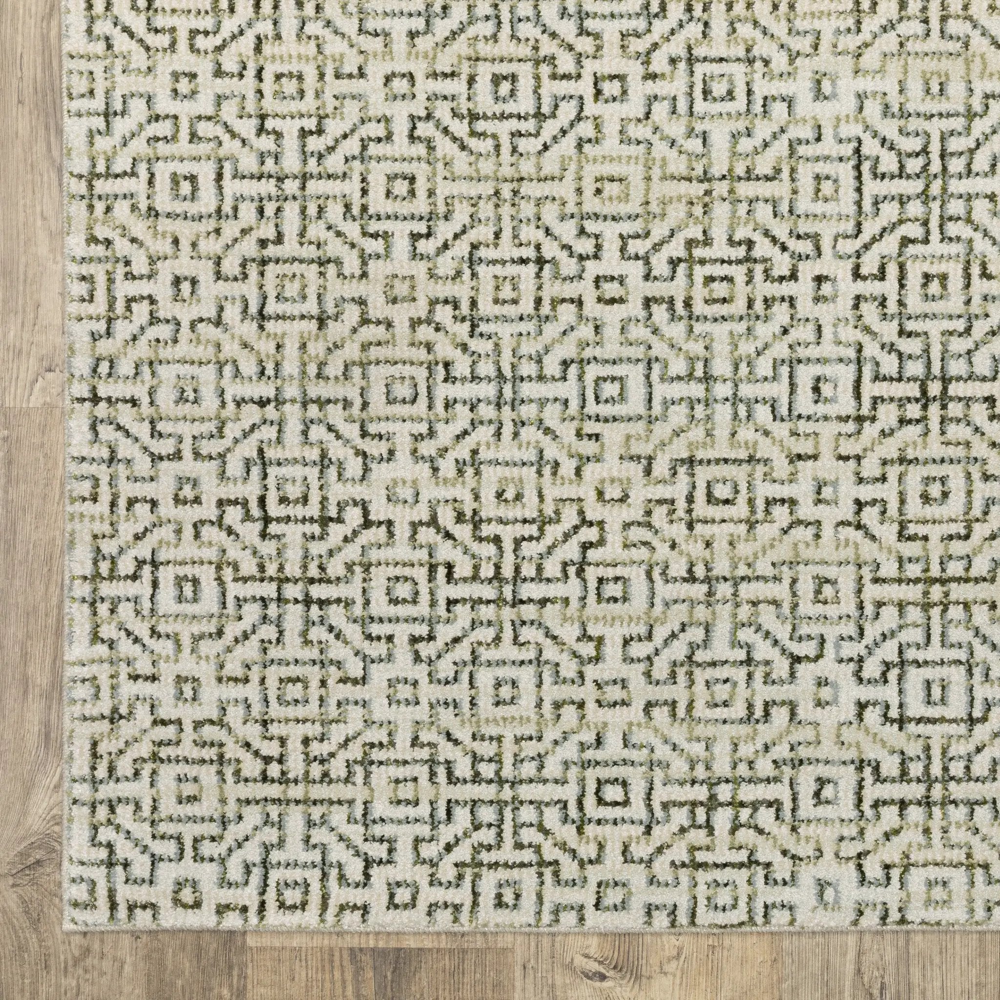 Atlas 3721K Ivory/ Green Area Rug by Oriental Weavers