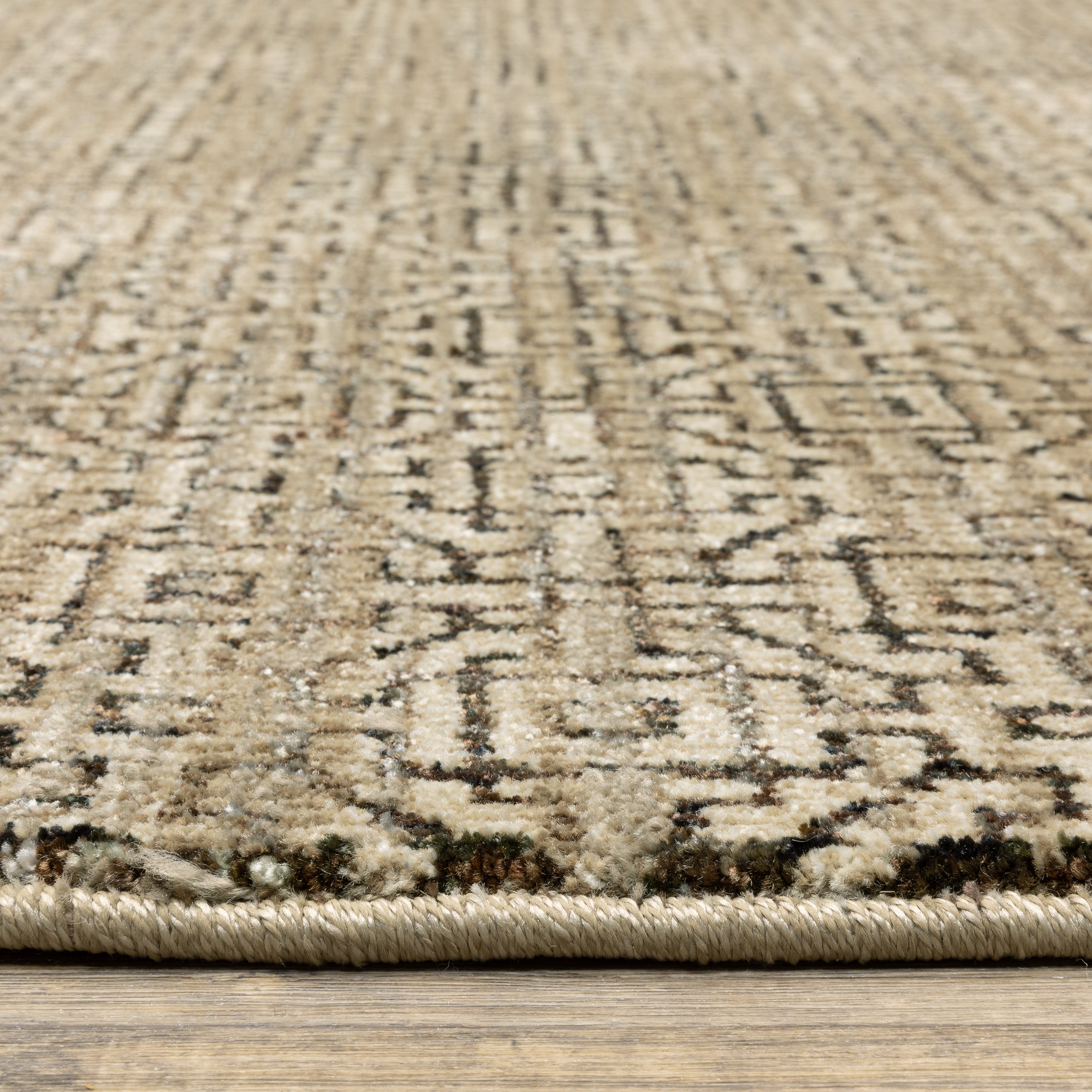 Oriental Weavers Atlas 3721S textured modern rug featuring textured design in brown/ tan tones