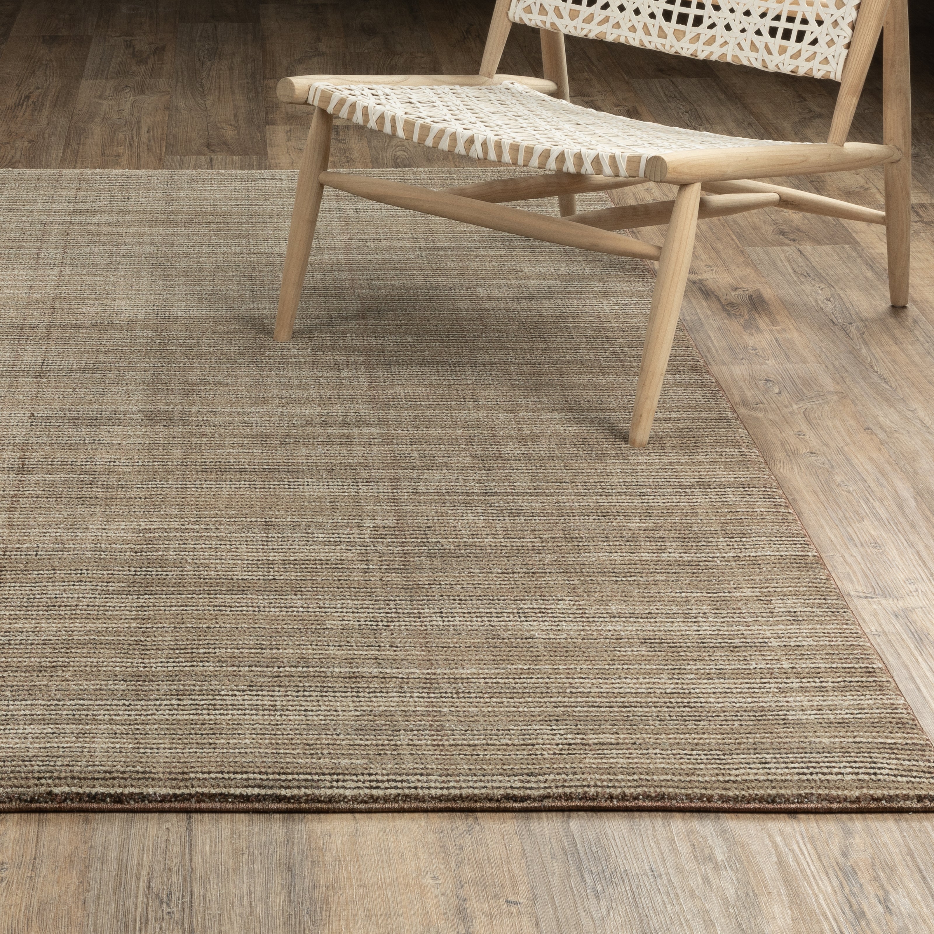 Oriental Weavers Atlas 3723T textured area rug featuring textured design in brown/ beige tones