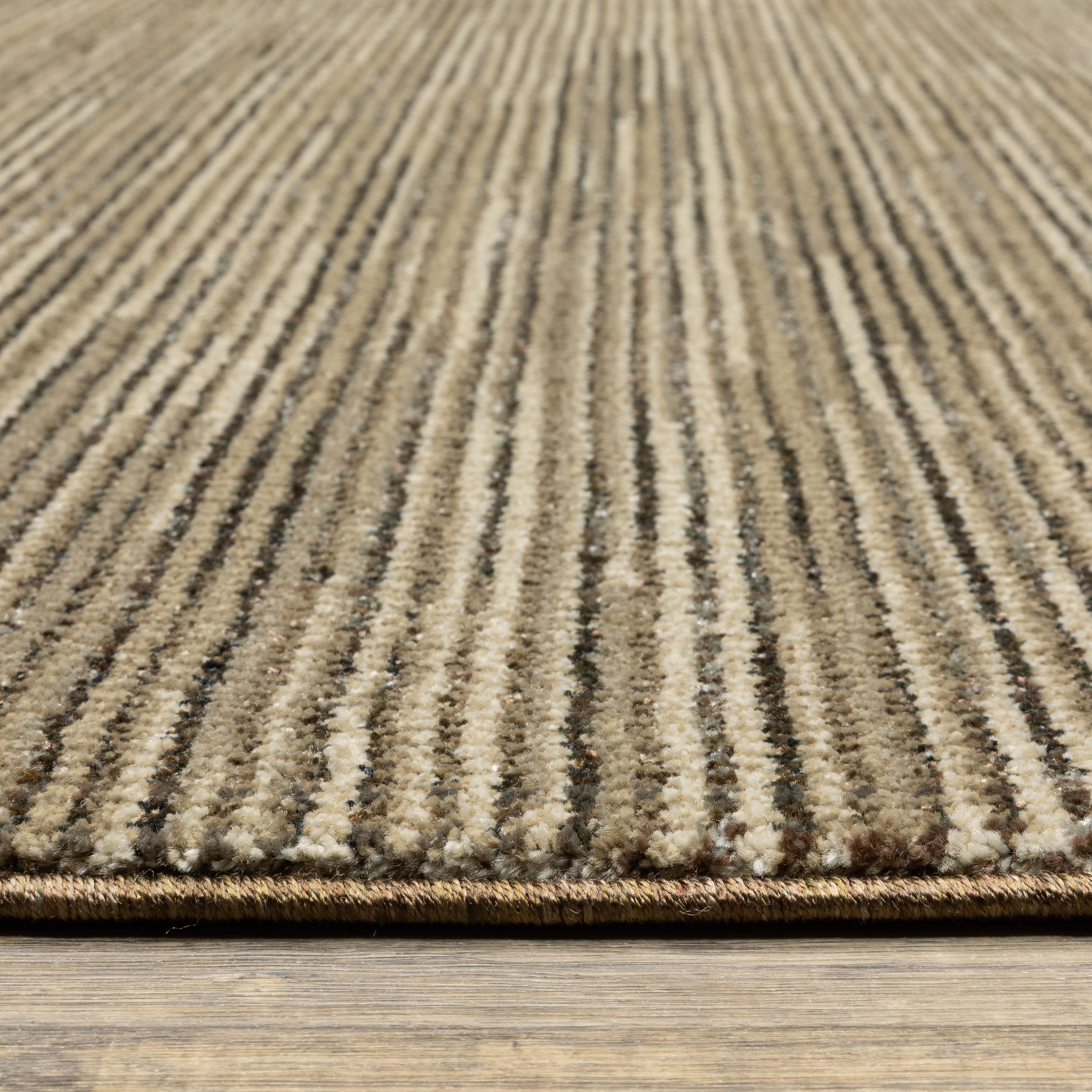 Oriental Weavers Atlas 3723T textured area rug featuring textured design in brown/ beige tones