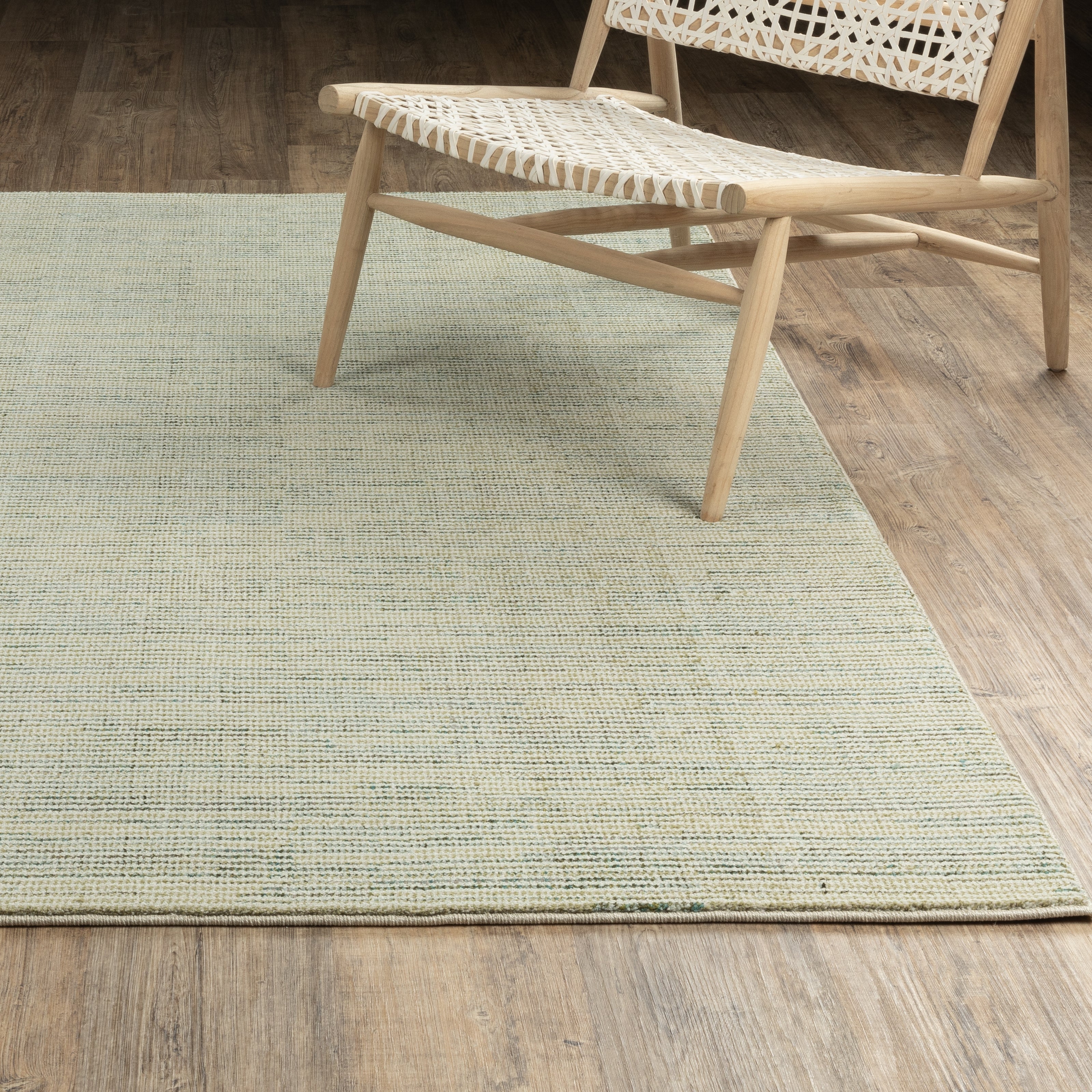 Oriental Weavers Atlas 3723U textured area rug featuring textured design in ivory/ blue tones