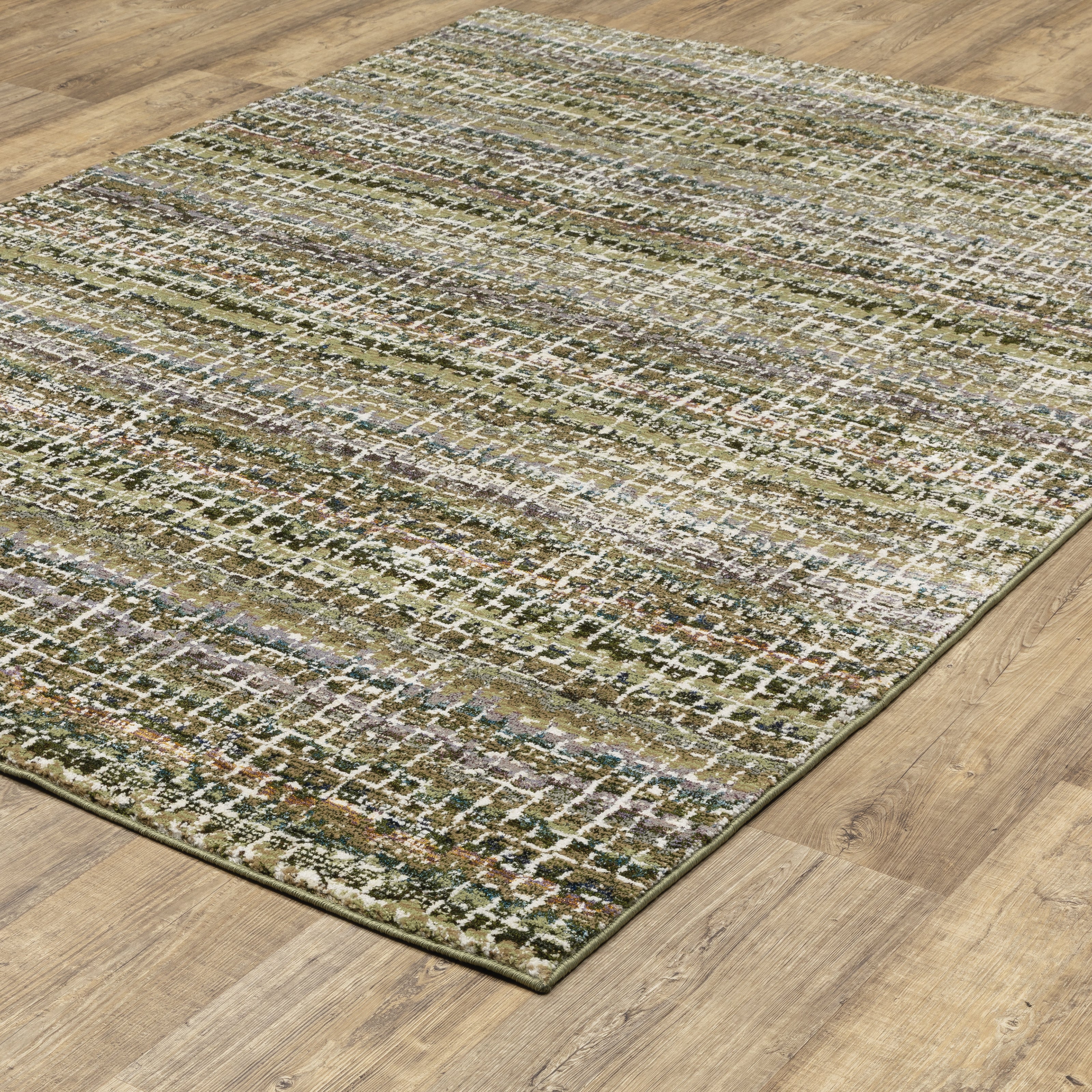 Oriental Weavers Atlas 747A0 textured area rug featuring textured design in green/ multi tones