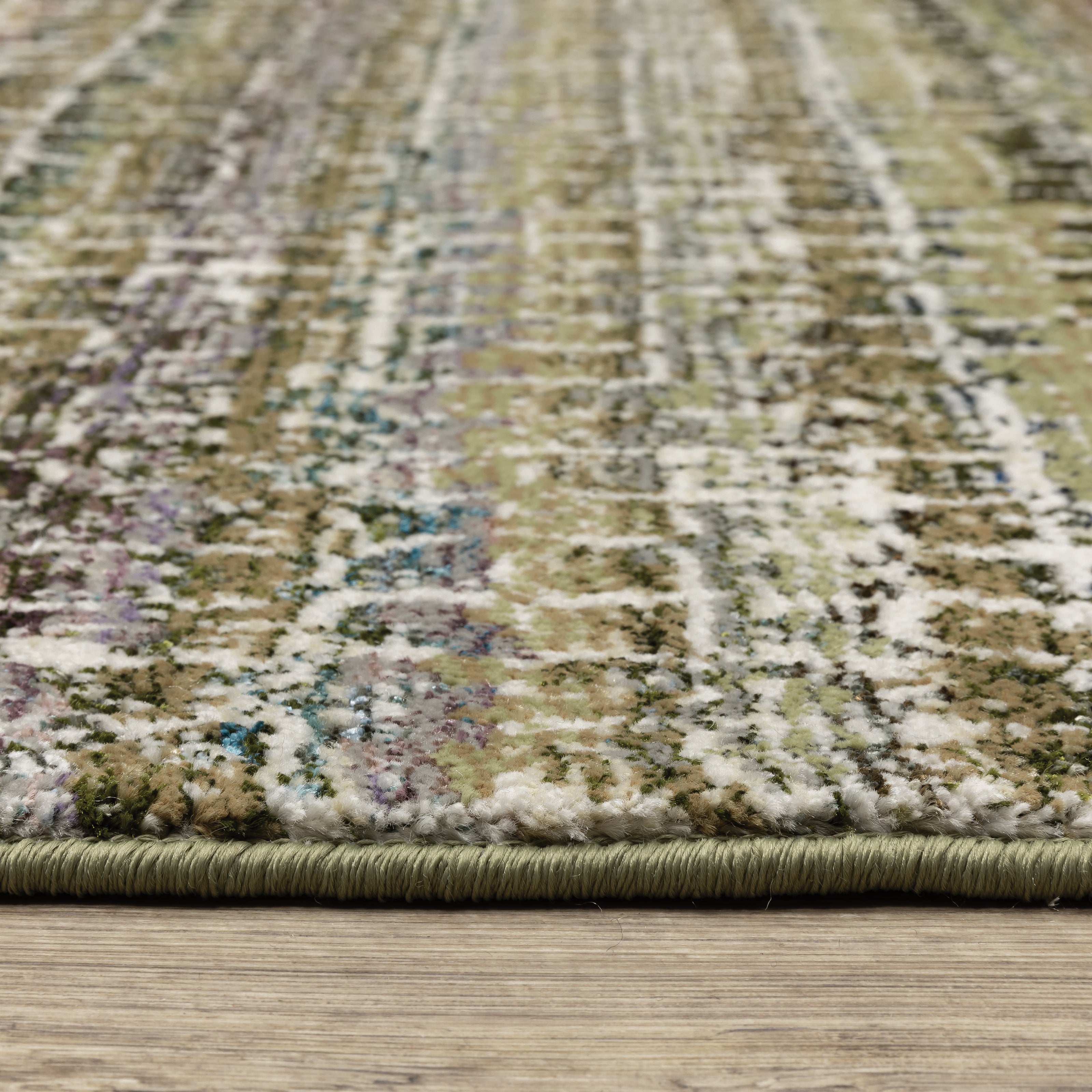 Oriental Weavers Atlas 747A0 textured area rug featuring textured design in green/ multi tones