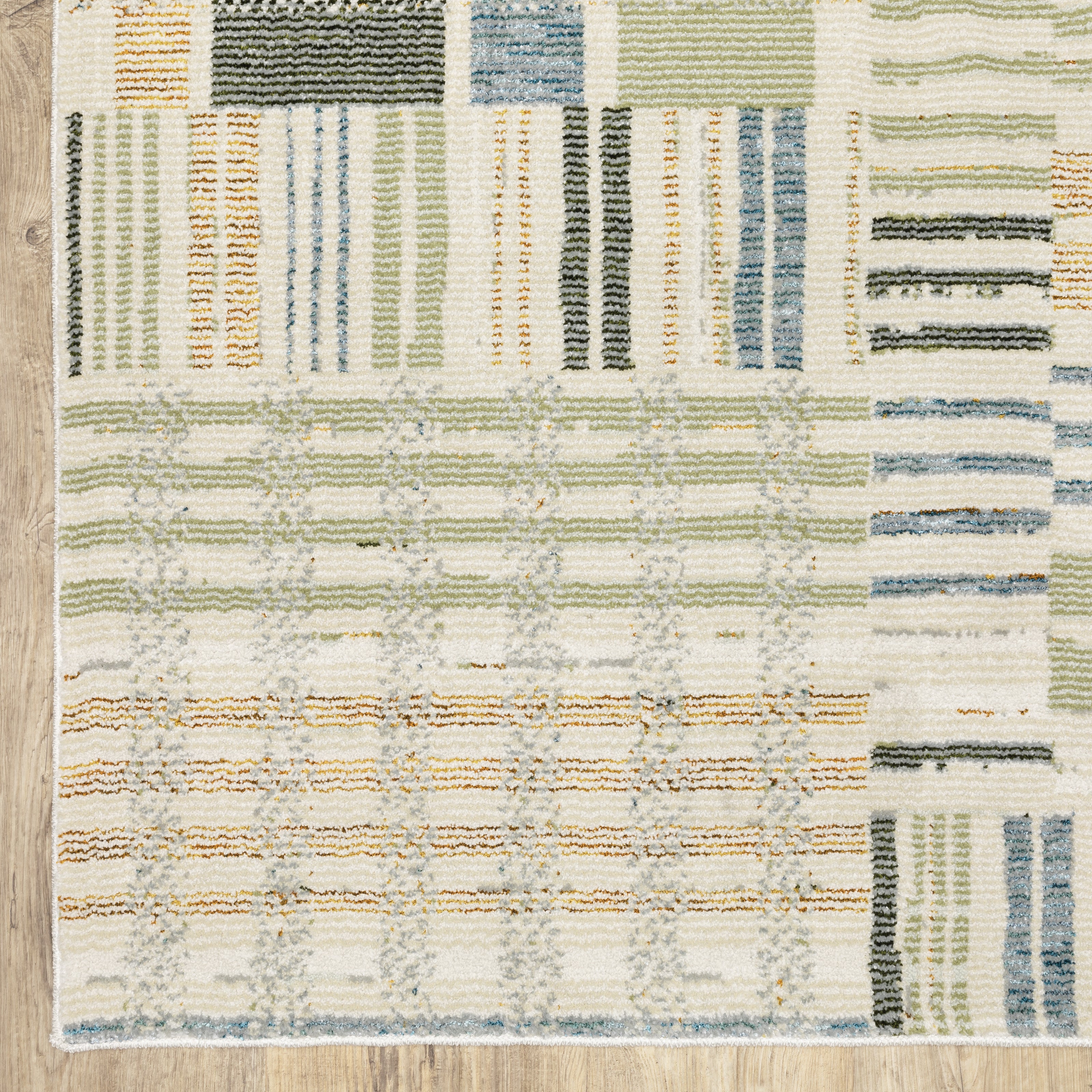 Oriental Weavers Atlas 752E0 textured area rug featuring textured design in blue/ green tones