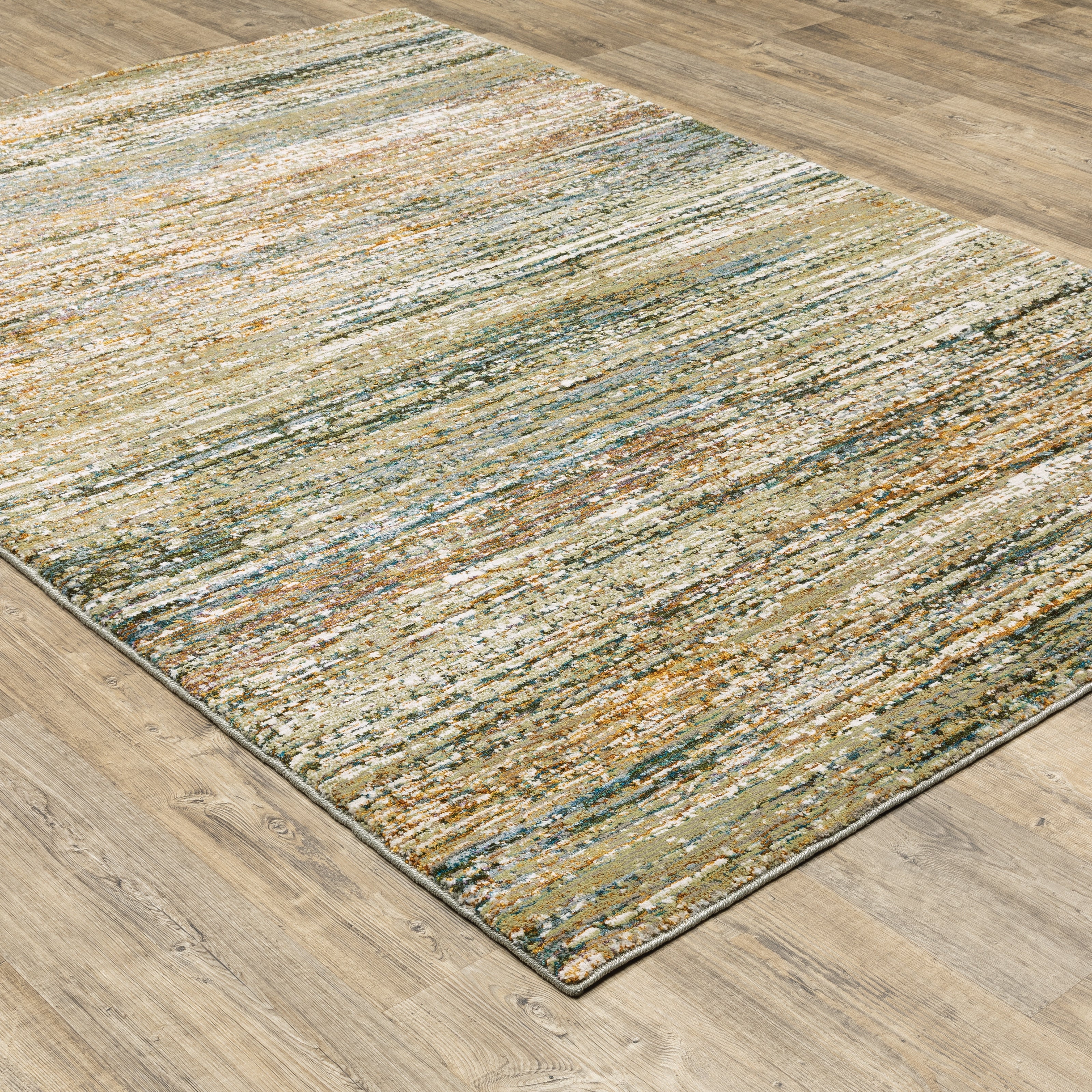 Oriental Weavers Atlas 8037J textured area rug featuring textured design in gold/ green tones