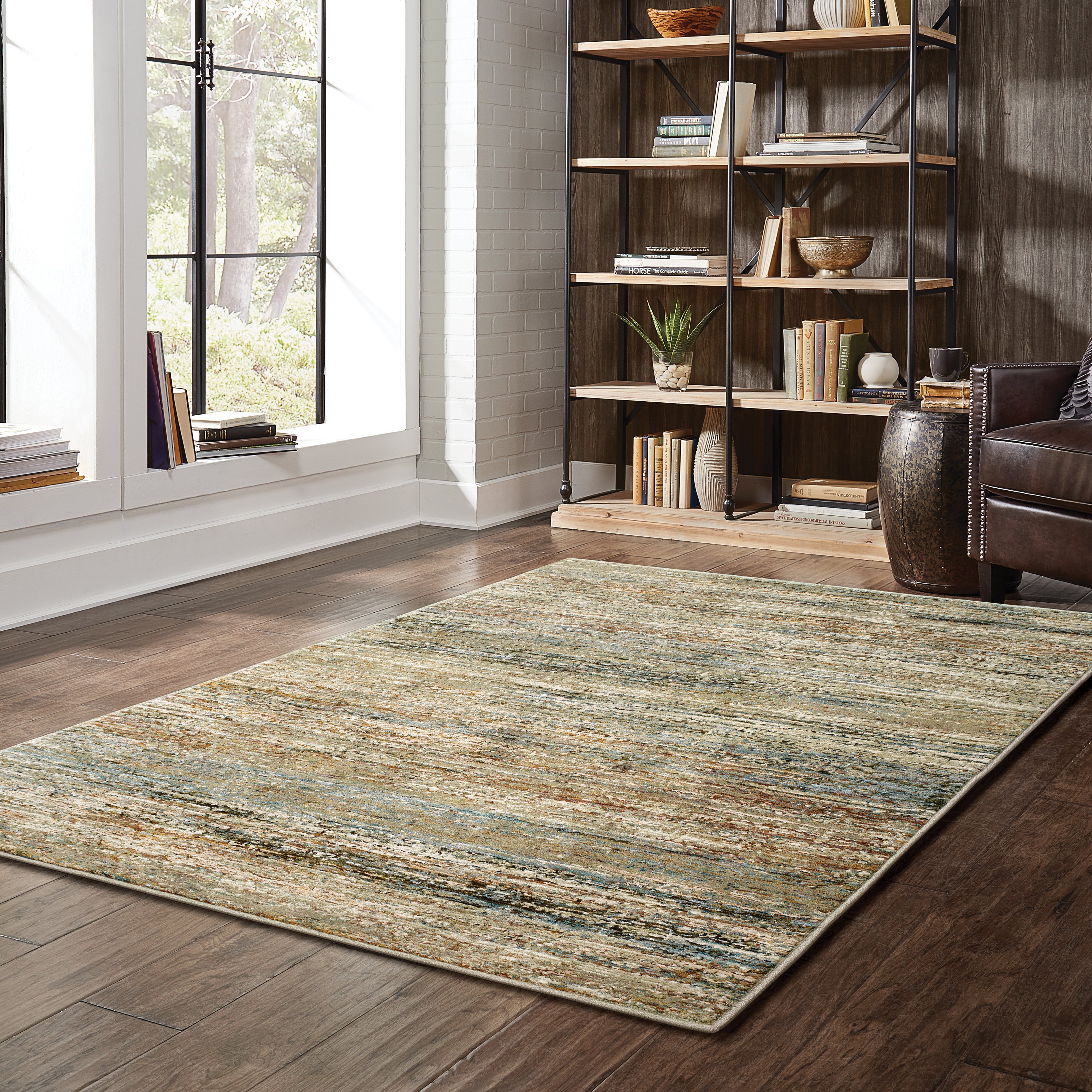 Oriental Weavers Atlas 8037J textured area rug featuring textured design in gold/ green tones