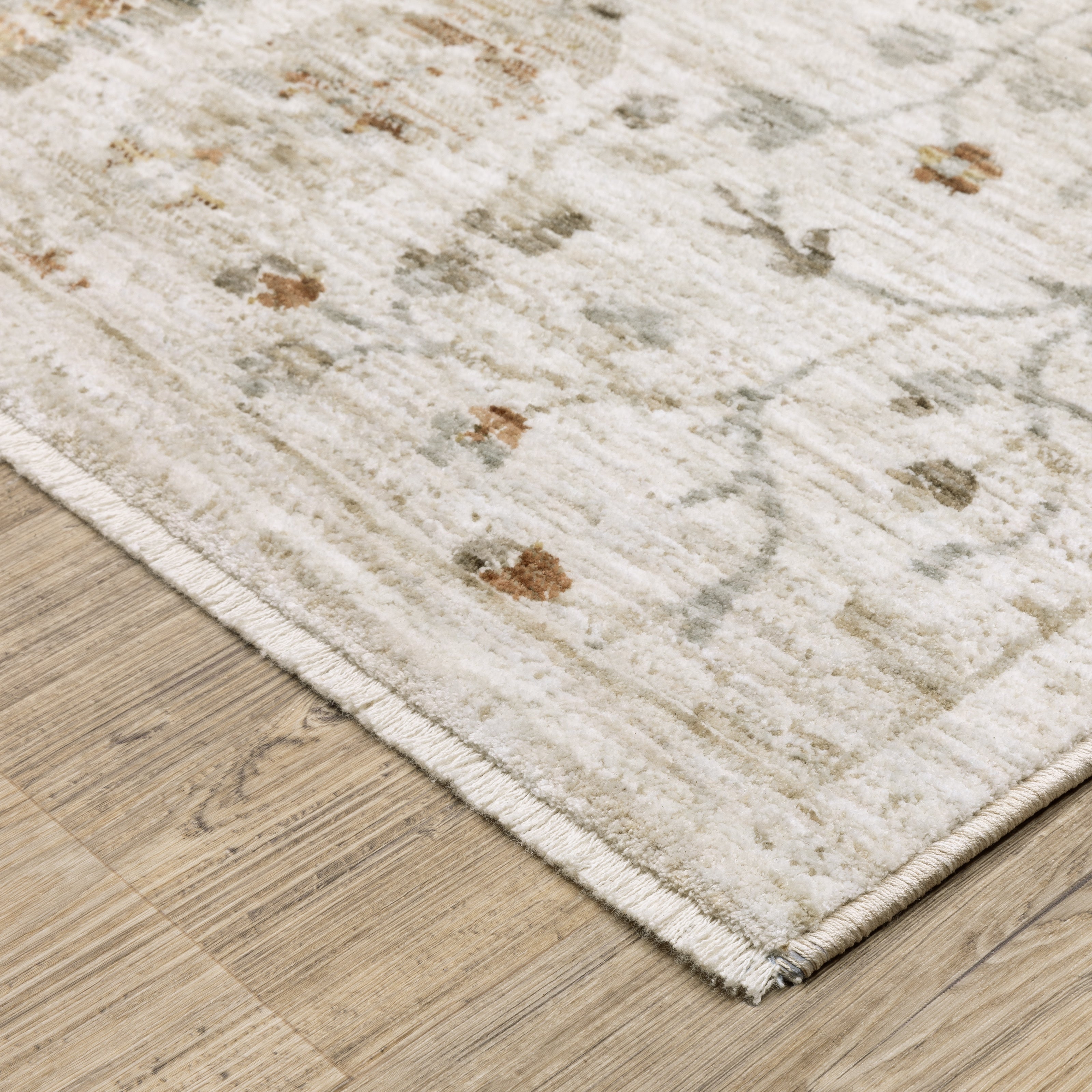 Oriental Weavers Avalon AVA01 soft transitional rug featuring decorative pattern in ivory/ beige tones