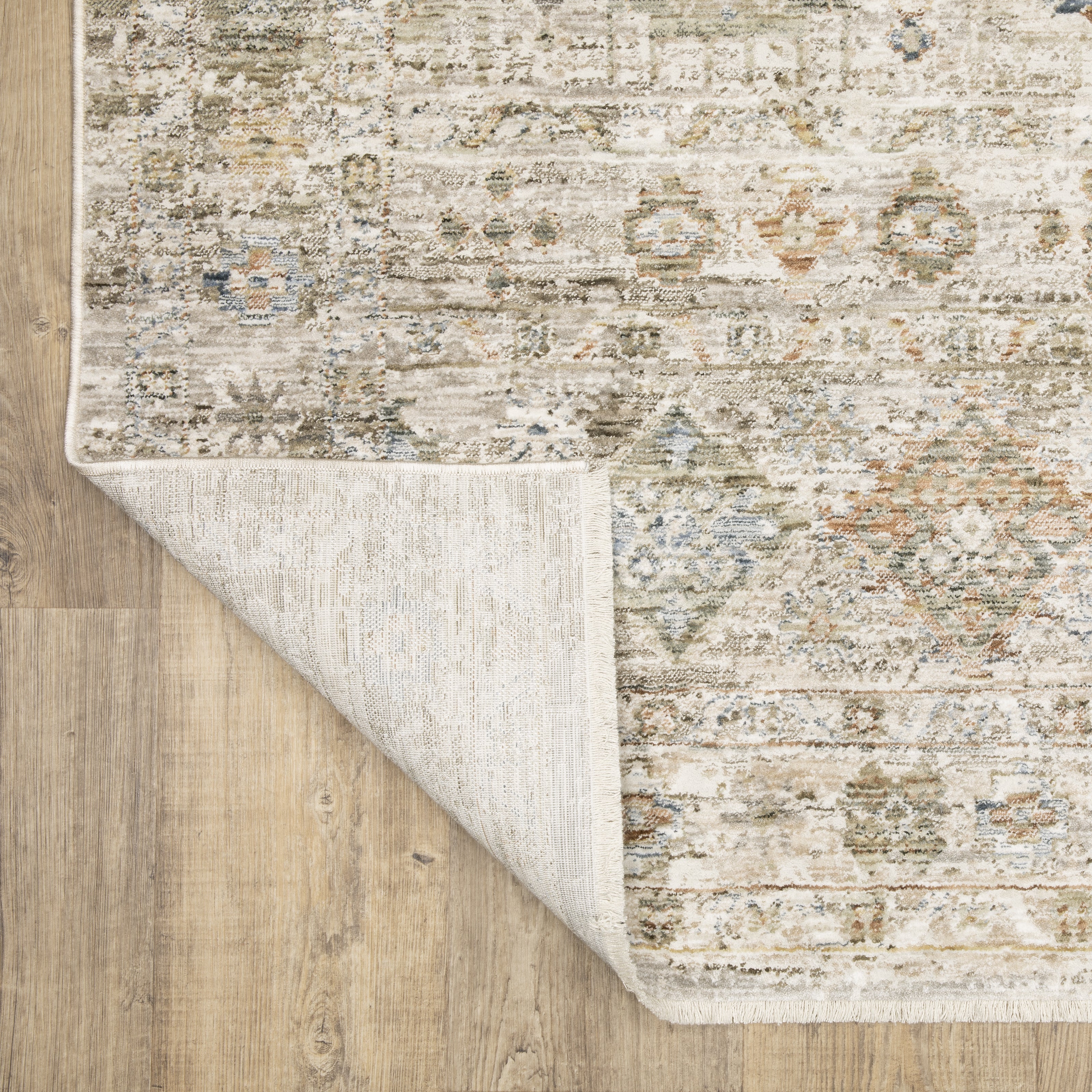 Oriental Weavers Avalon AVA05 soft transitional rug featuring decorative pattern in beige/ grey tones