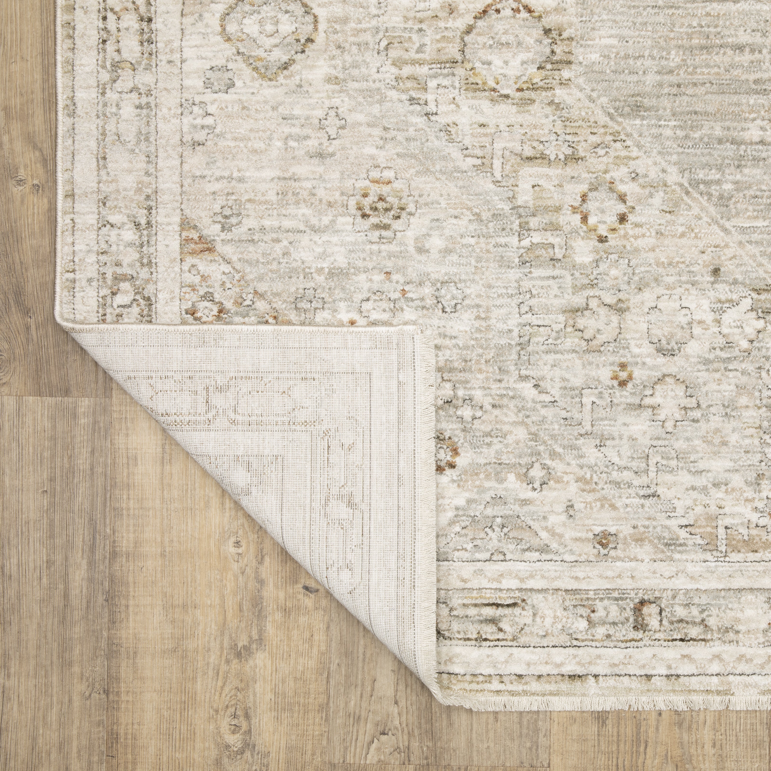 Oriental Weavers Avalon AVA06 soft transitional rug featuring decorative pattern in beige/ ivory tones