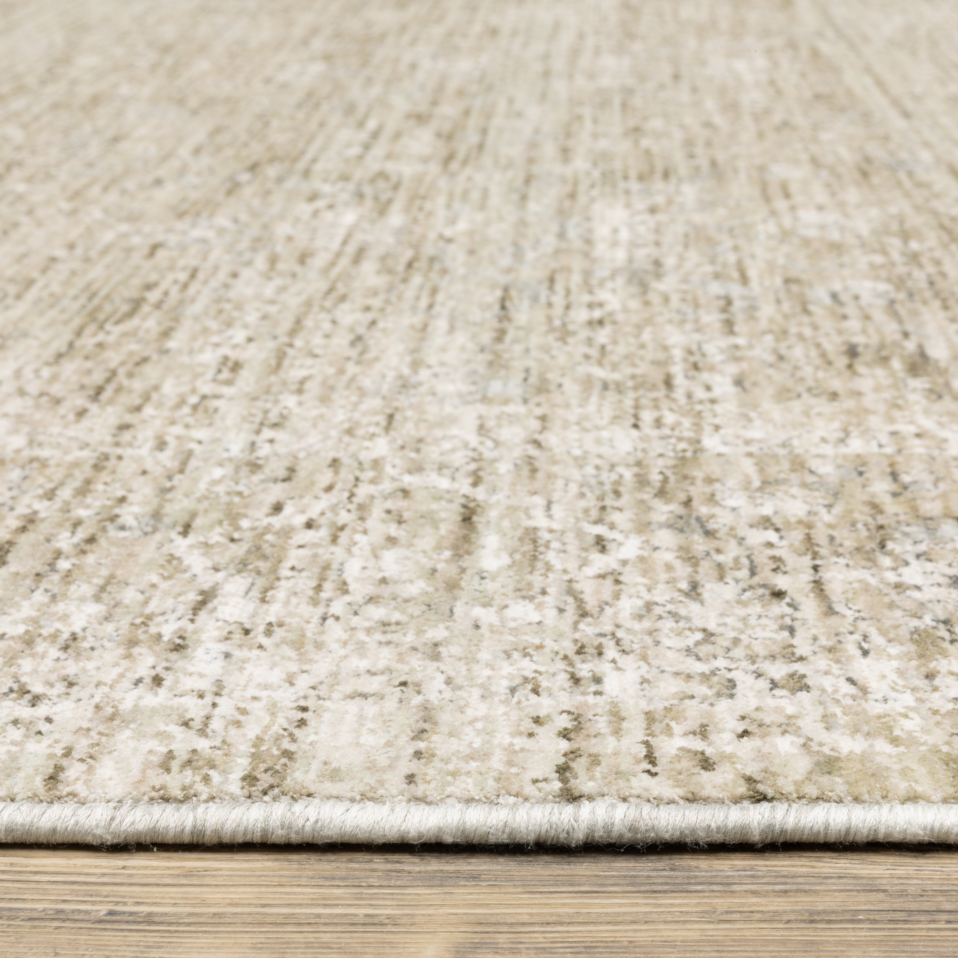Oriental Weavers Avalon AVA07 soft transitional rug featuring decorative pattern in beige/ grey tones