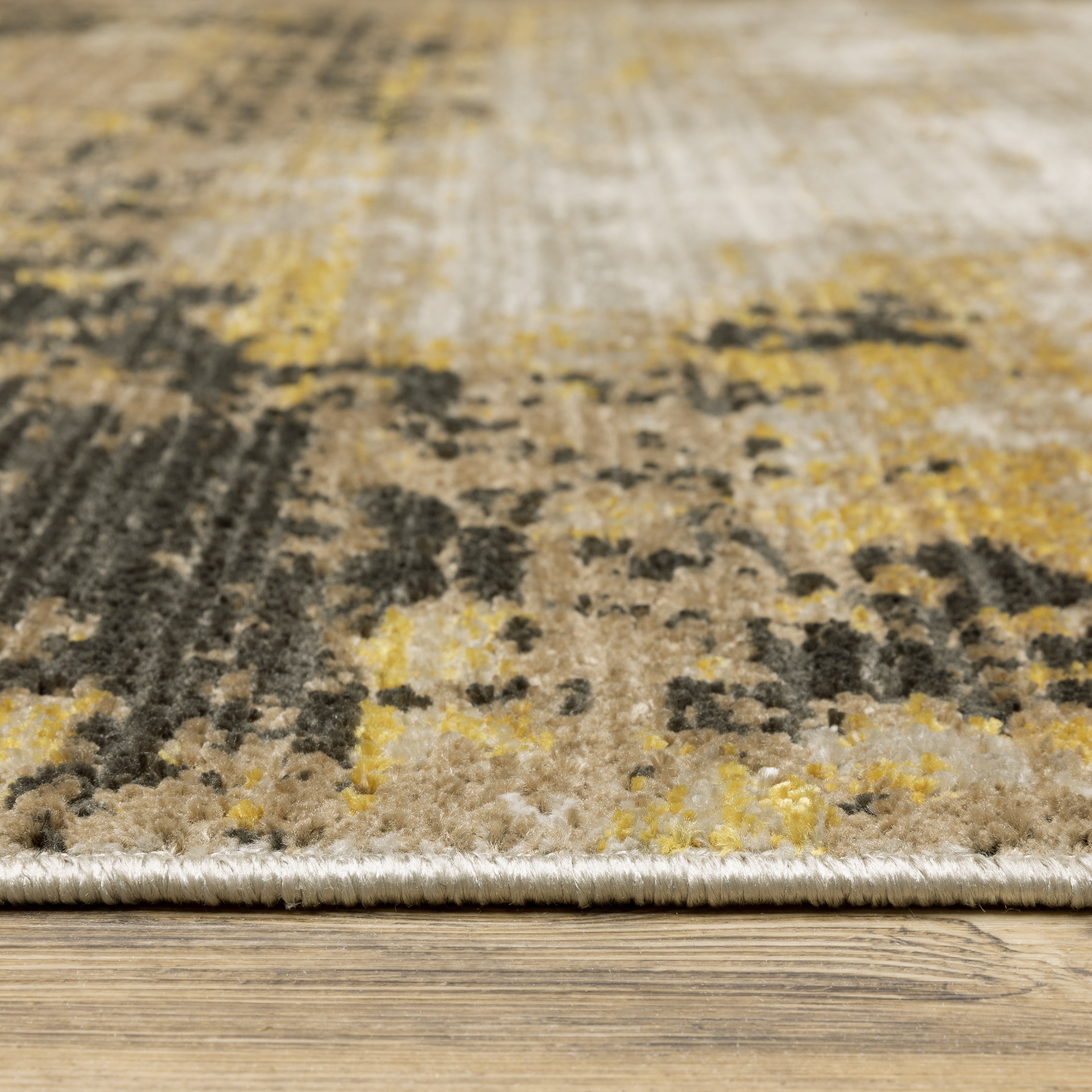 Oriental Weavers Bauer 2061X plush modern rug featuring abstract pattern in gold/ black tones