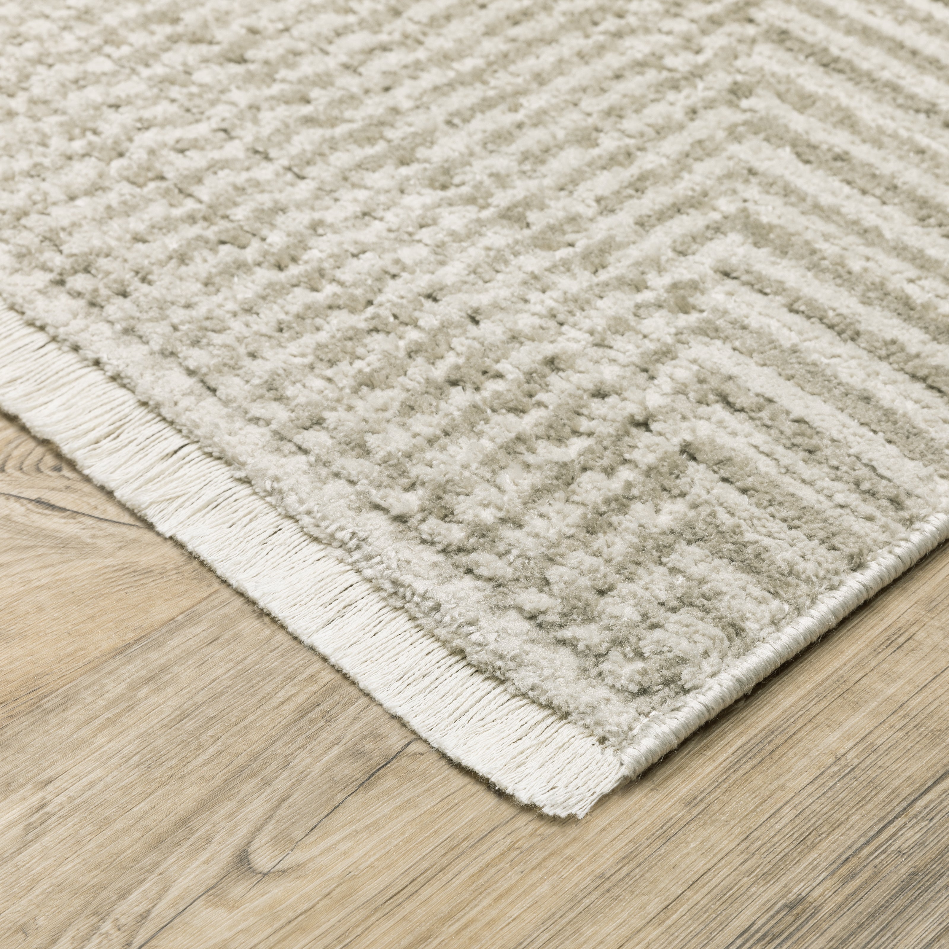 Oriental Weavers Bauer 4150E plush modern rug featuring abstract pattern in beige/ ivory tones