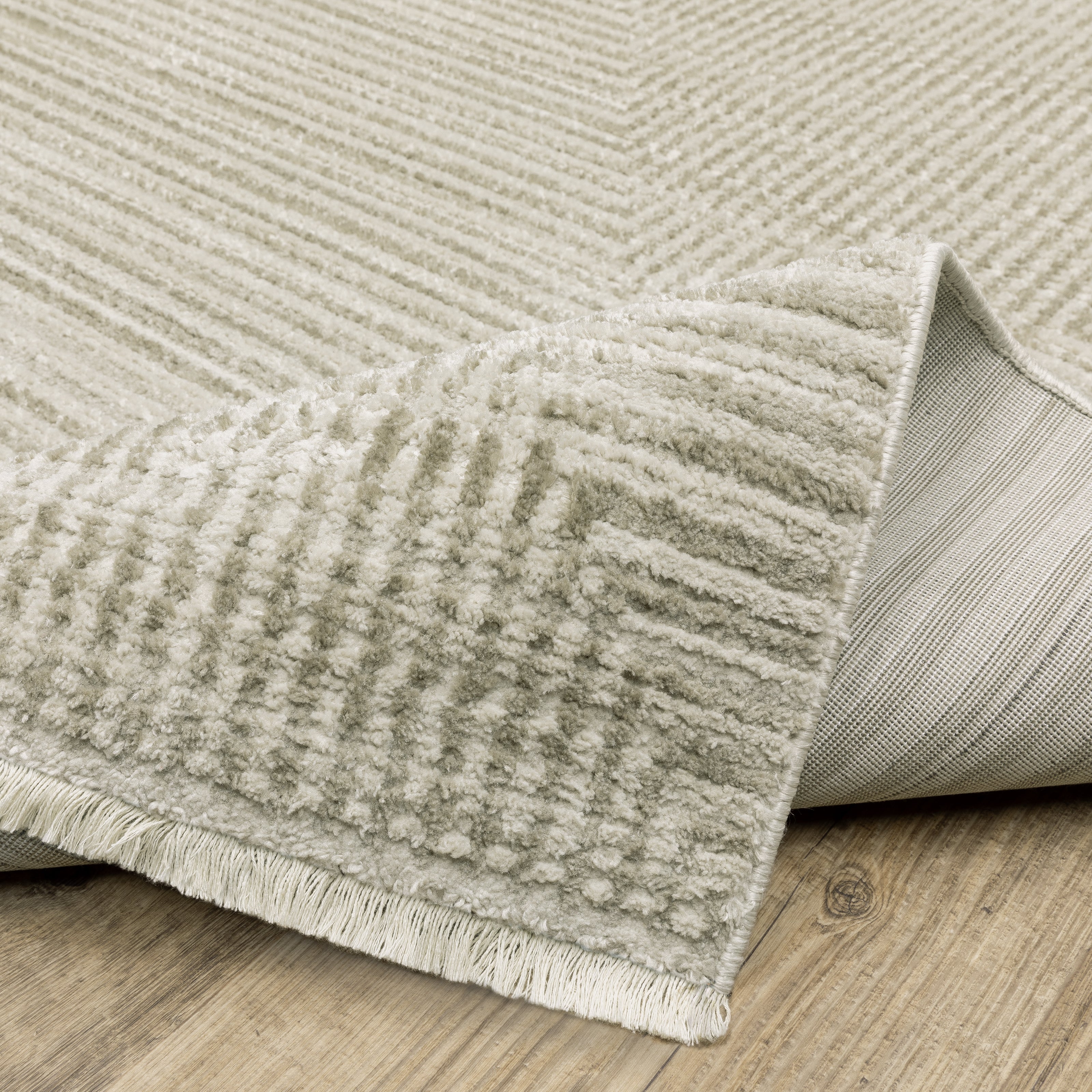 Oriental Weavers Bauer 4150E plush modern rug featuring abstract pattern in beige/ ivory tones