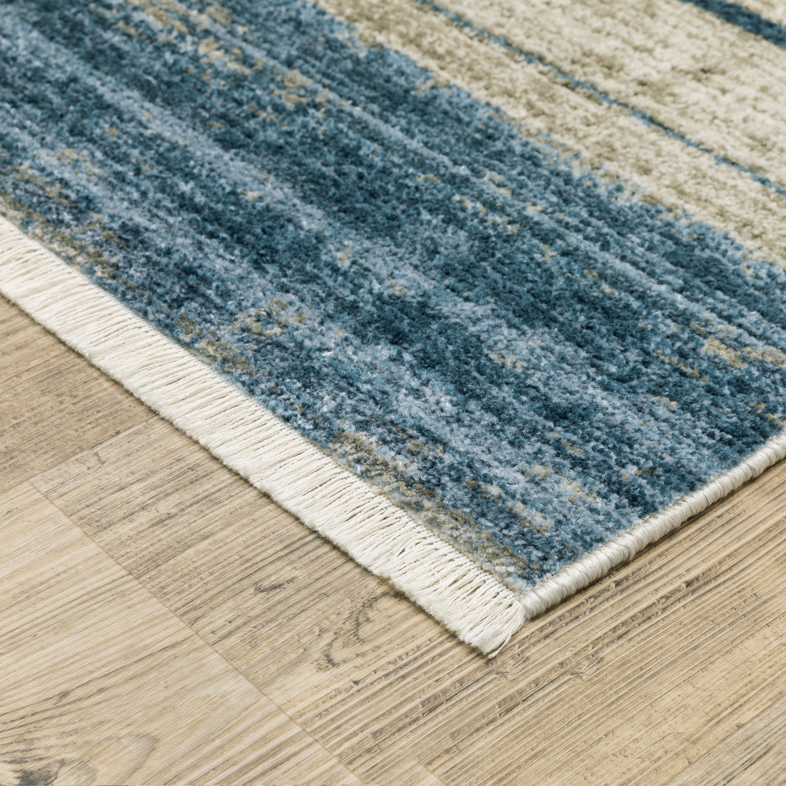 Oriental Weavers Bauer 090B2 plush modern rug featuring abstract pattern in blue/ beige tones