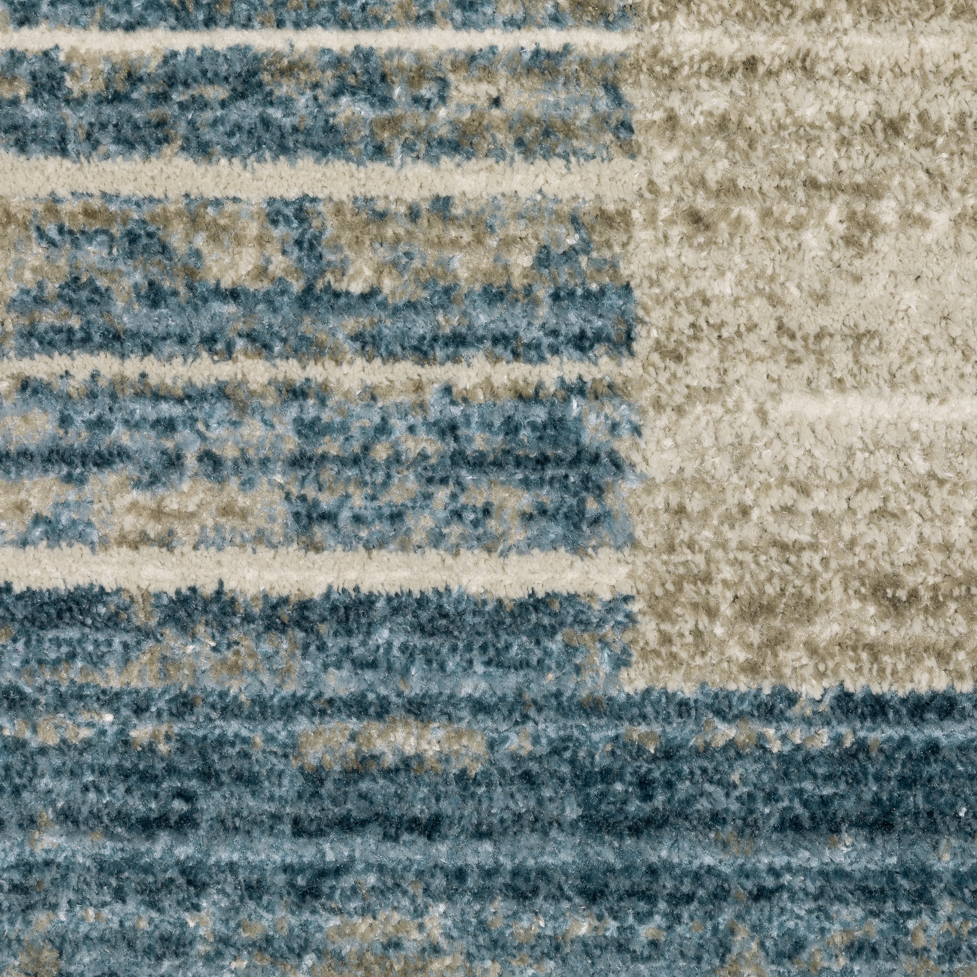 Oriental Weavers Bauer 090B2 plush modern rug featuring abstract pattern in blue/ beige tones