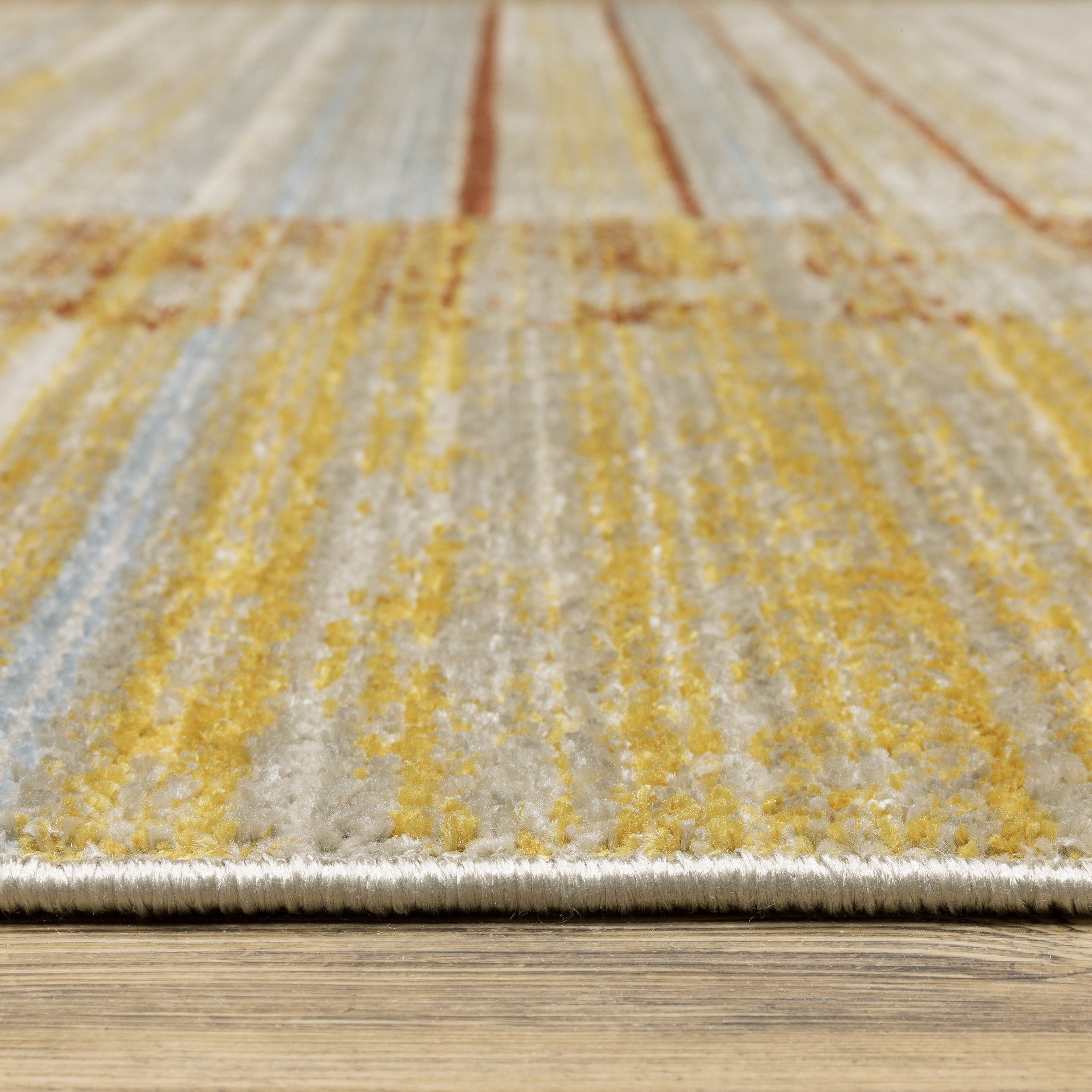 Oriental Weavers Bauer 090R2 plush modern rug featuring abstract pattern in rust/ gold tones