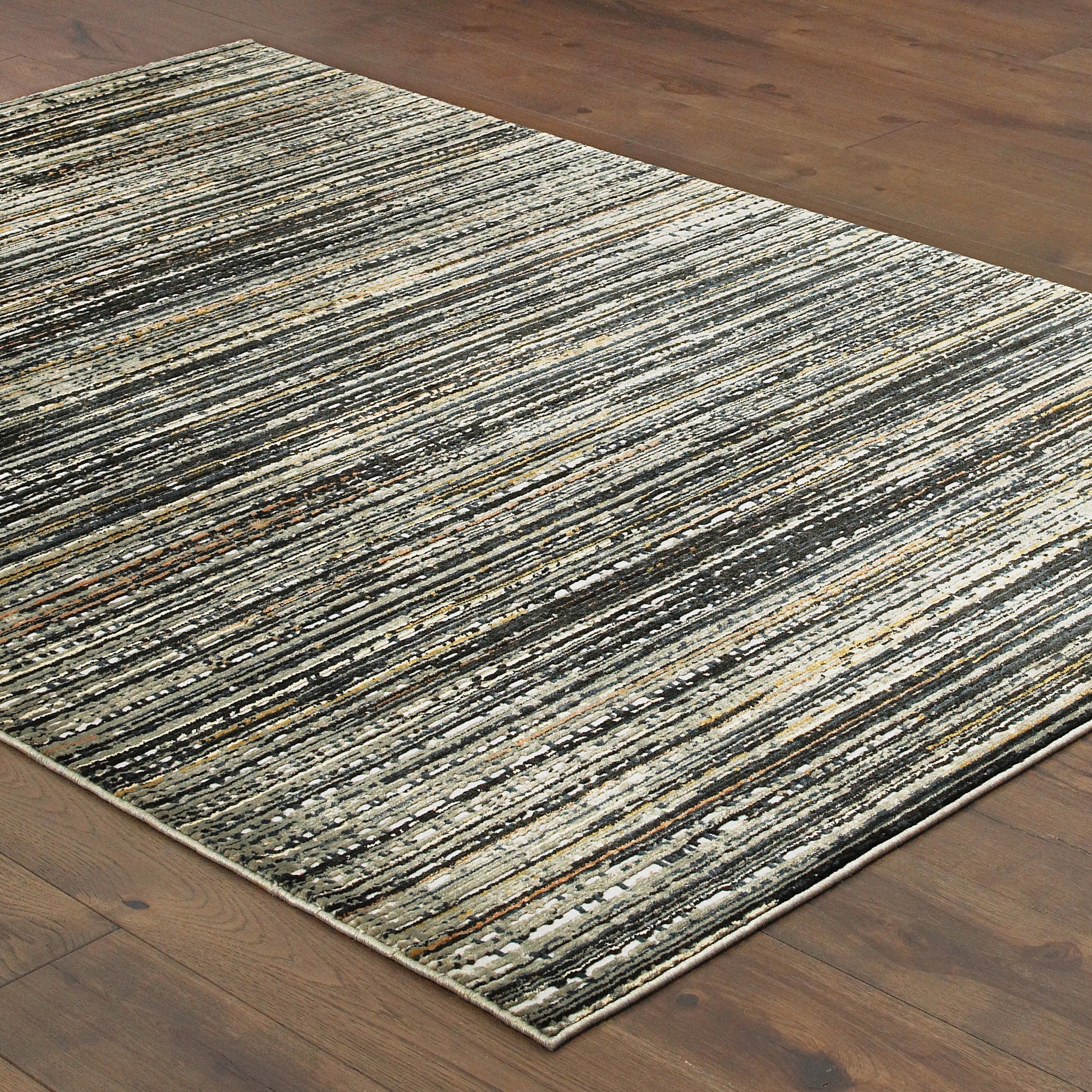 Oriental Weavers Bowen 1332H soft transitional rug featuring textured design in black/ navy tones