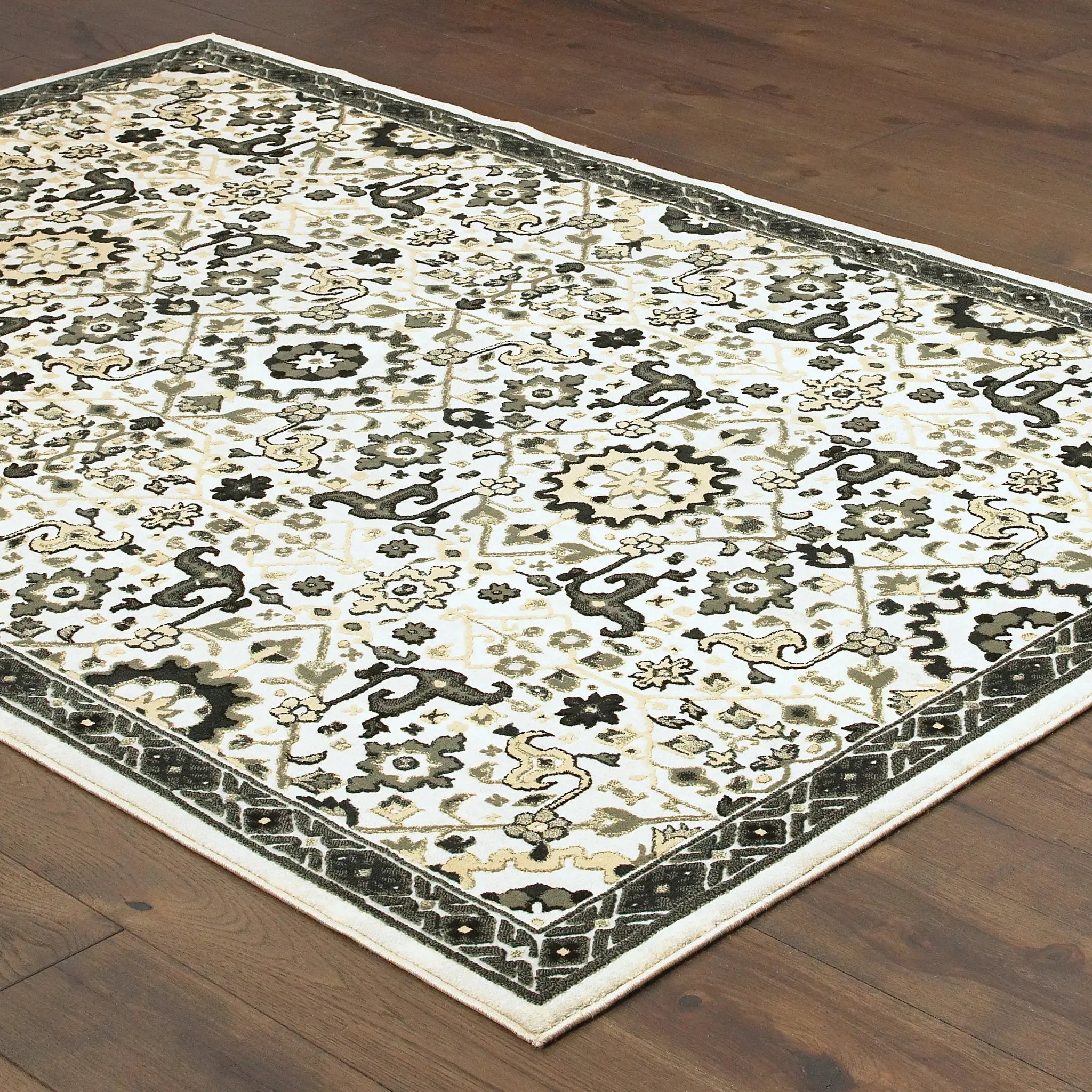 Bowen 073J2 Ivory/ Navy Area Rug by Oriental Weavers