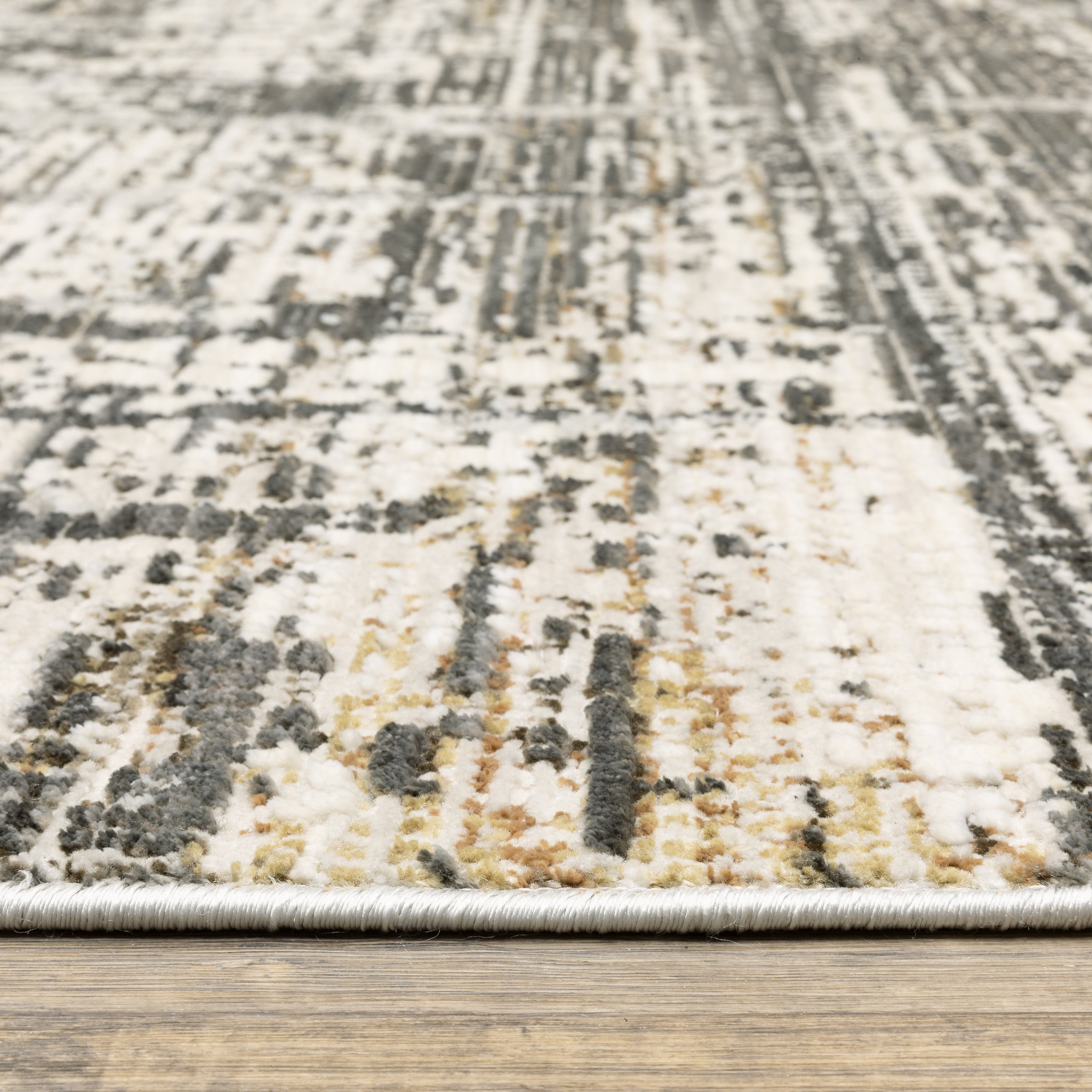 Oriental Weavers Branigan BRG01 soft modern rug featuring abstract pattern in ivory / brown tones