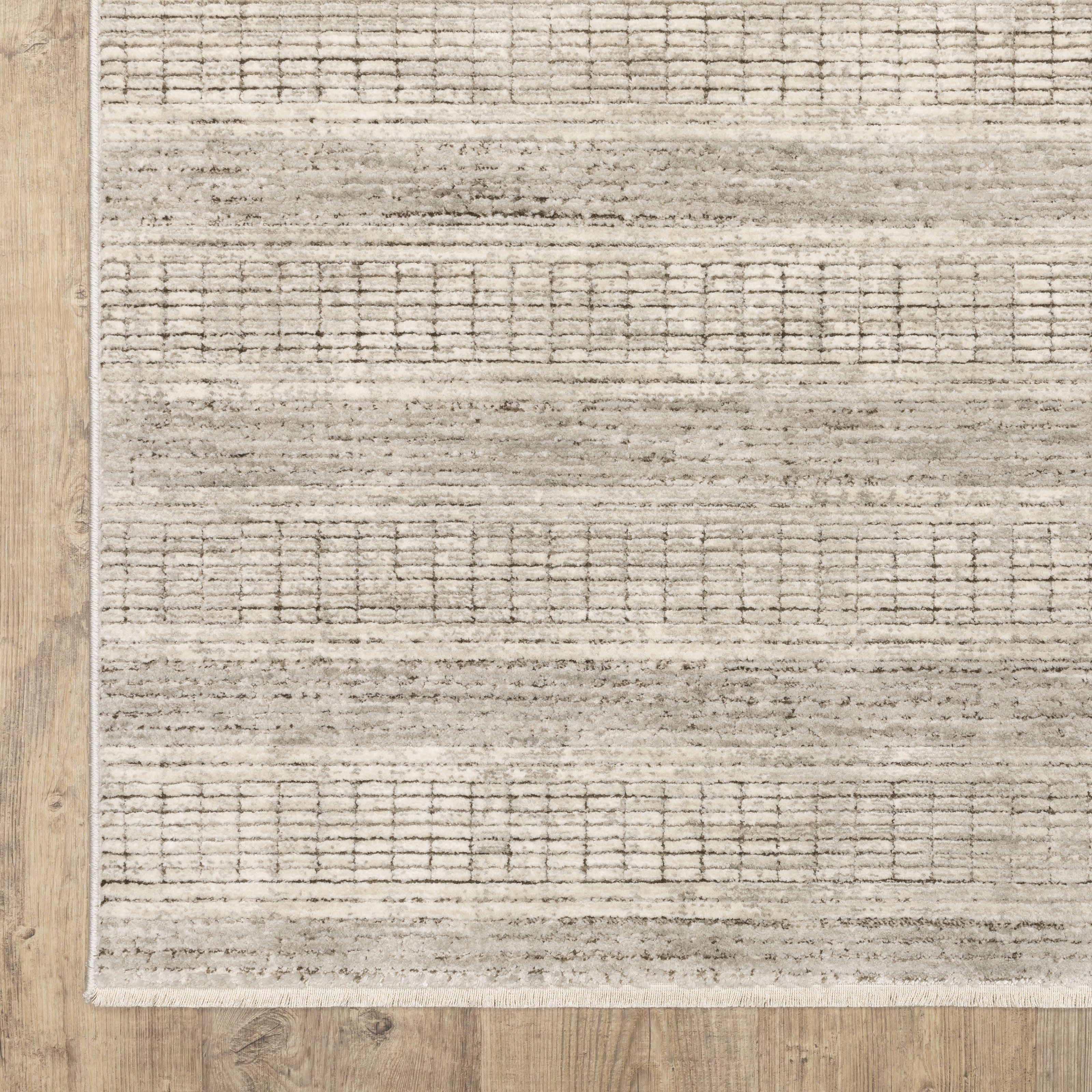 Oriental Weavers Branigan BRG03 soft modern rug featuring abstract pattern in ivory / brown tones