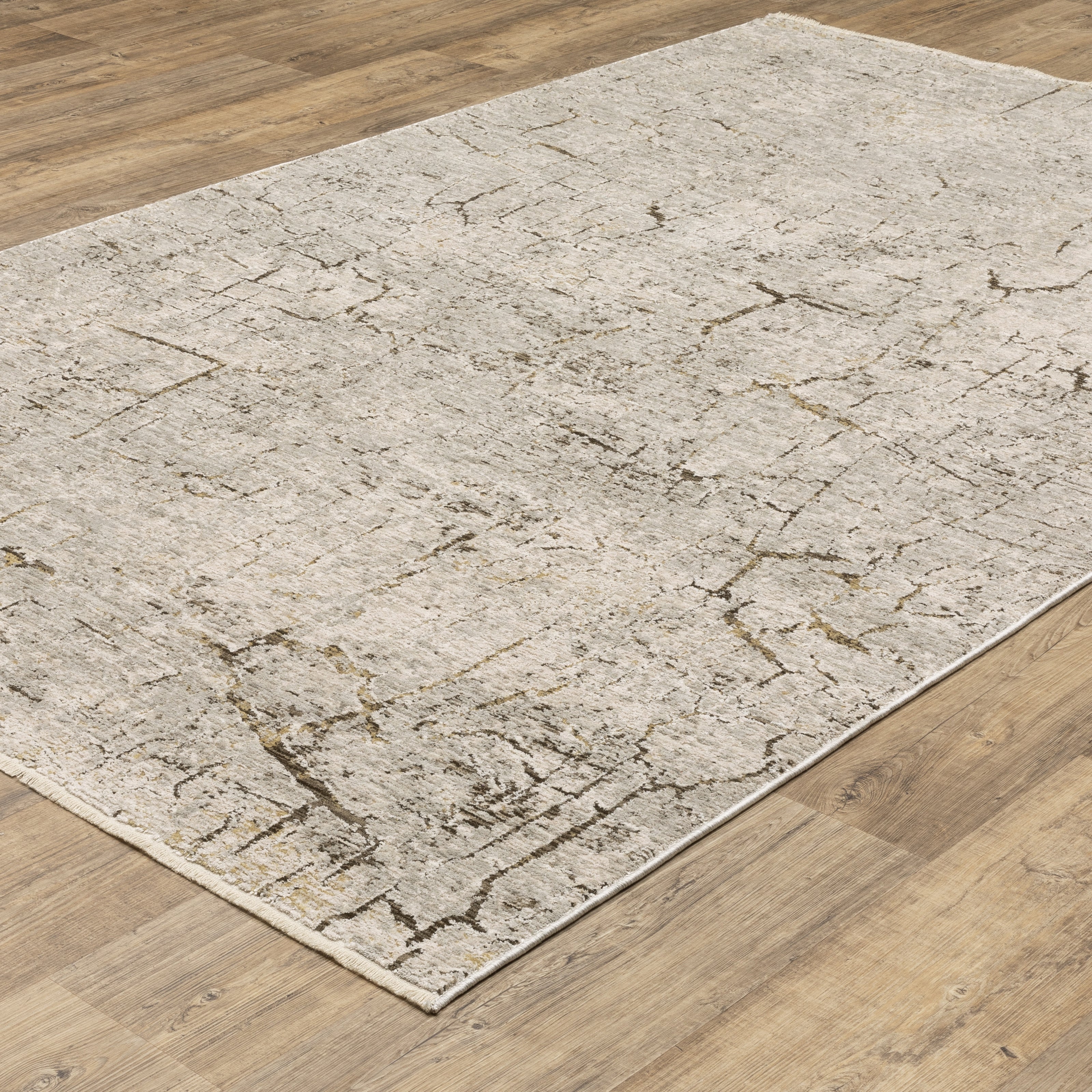 Oriental Weavers Branigan BRG05 soft modern rug featuring abstract pattern in grey/ gold tones