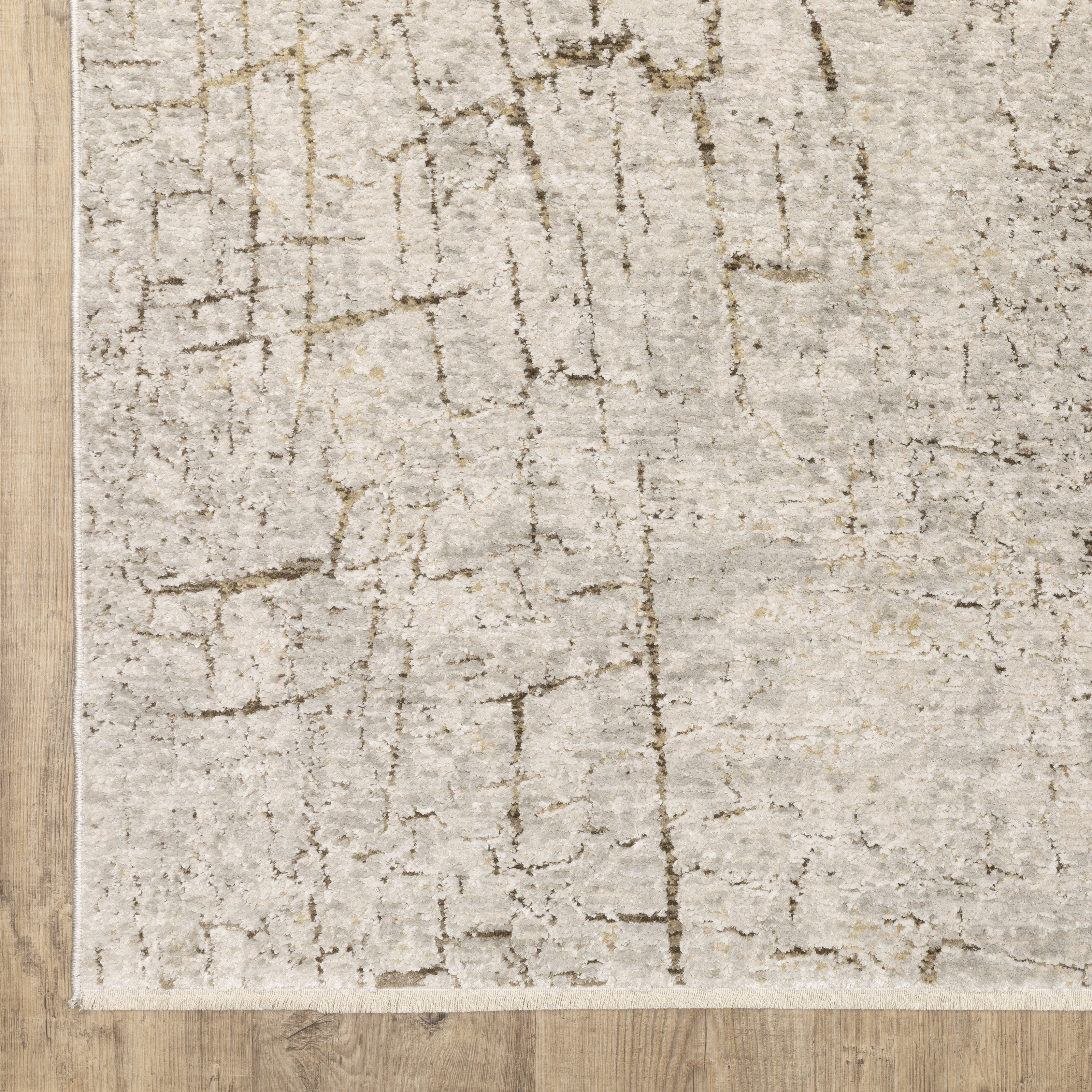 Oriental Weavers Branigan BRG05 soft modern rug featuring abstract pattern in grey/ gold tones