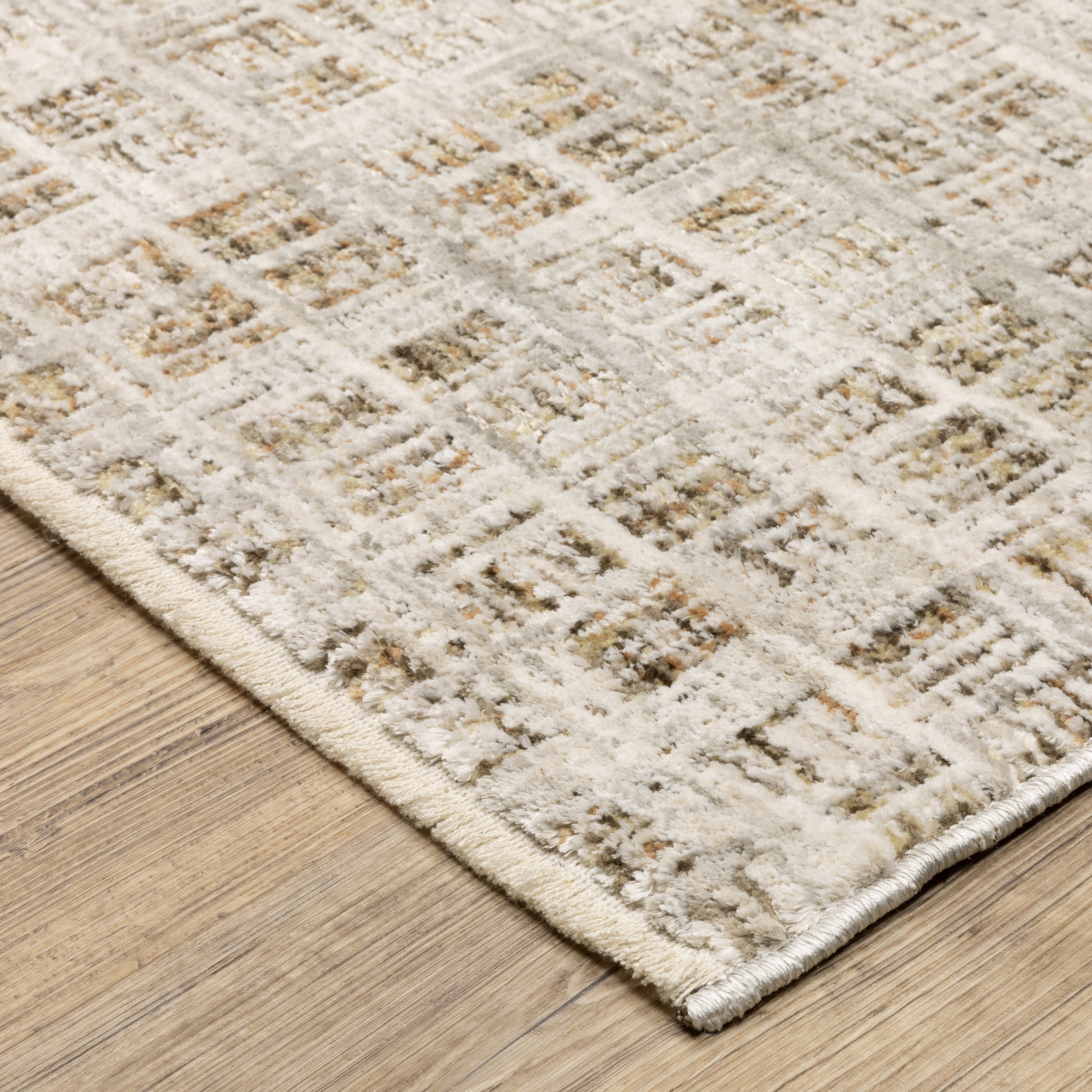 Oriental Weavers Branigan BRG07 soft modern rug featuring abstract pattern in ivory / brown tones