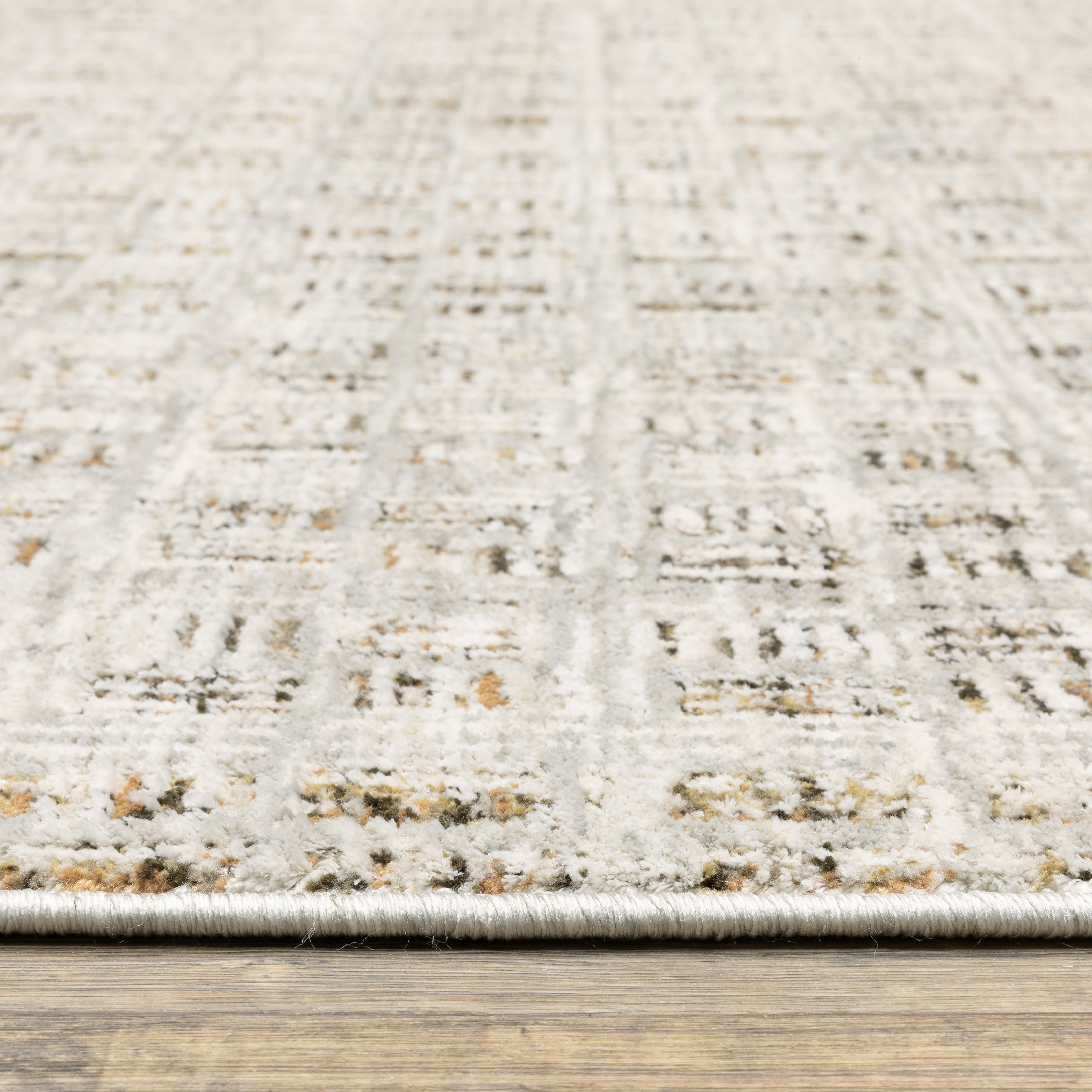 Oriental Weavers Branigan BRG07 soft modern rug featuring abstract pattern in ivory / brown tones