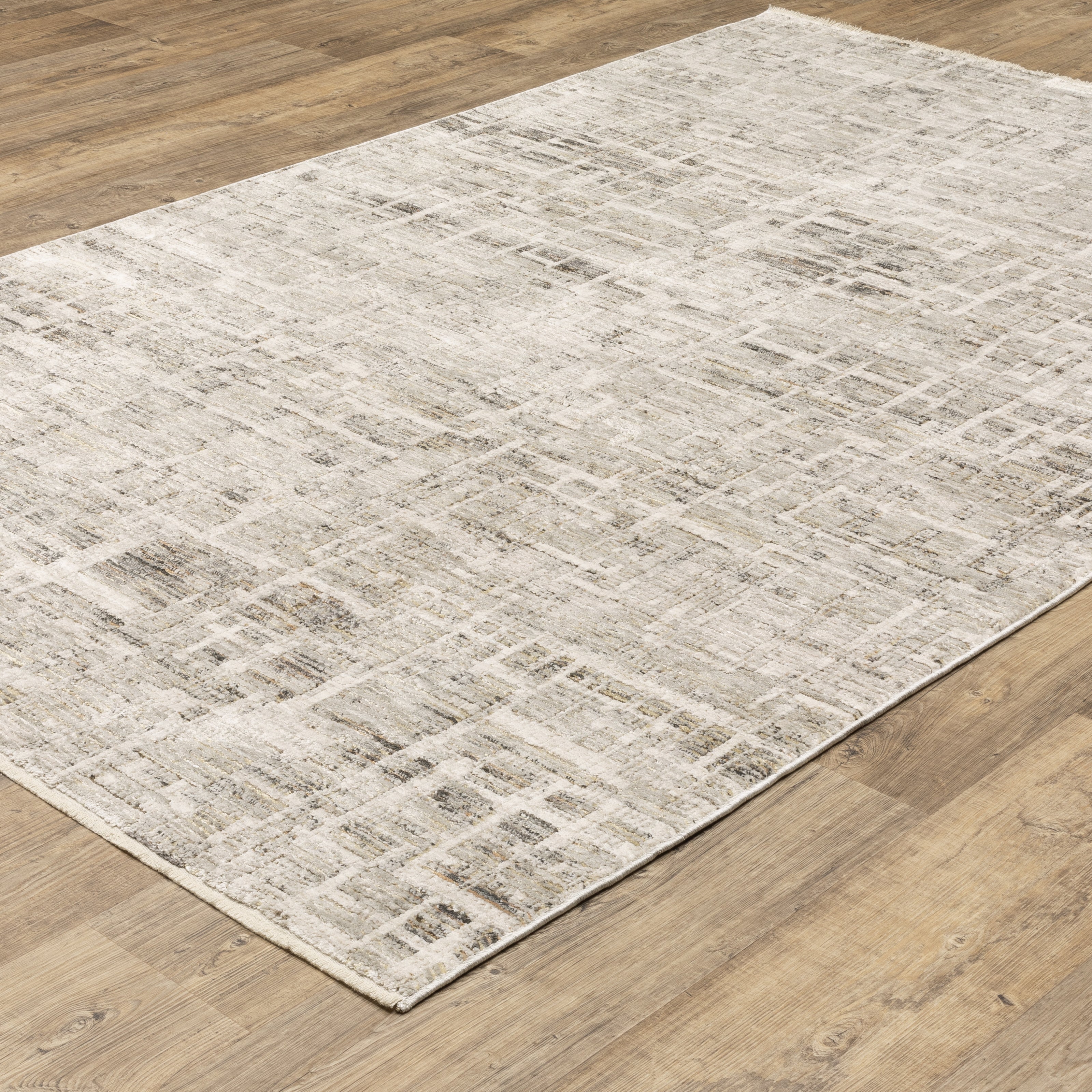 Oriental Weavers Branigan BRG08 soft modern rug featuring abstract pattern in ivory / grey tones