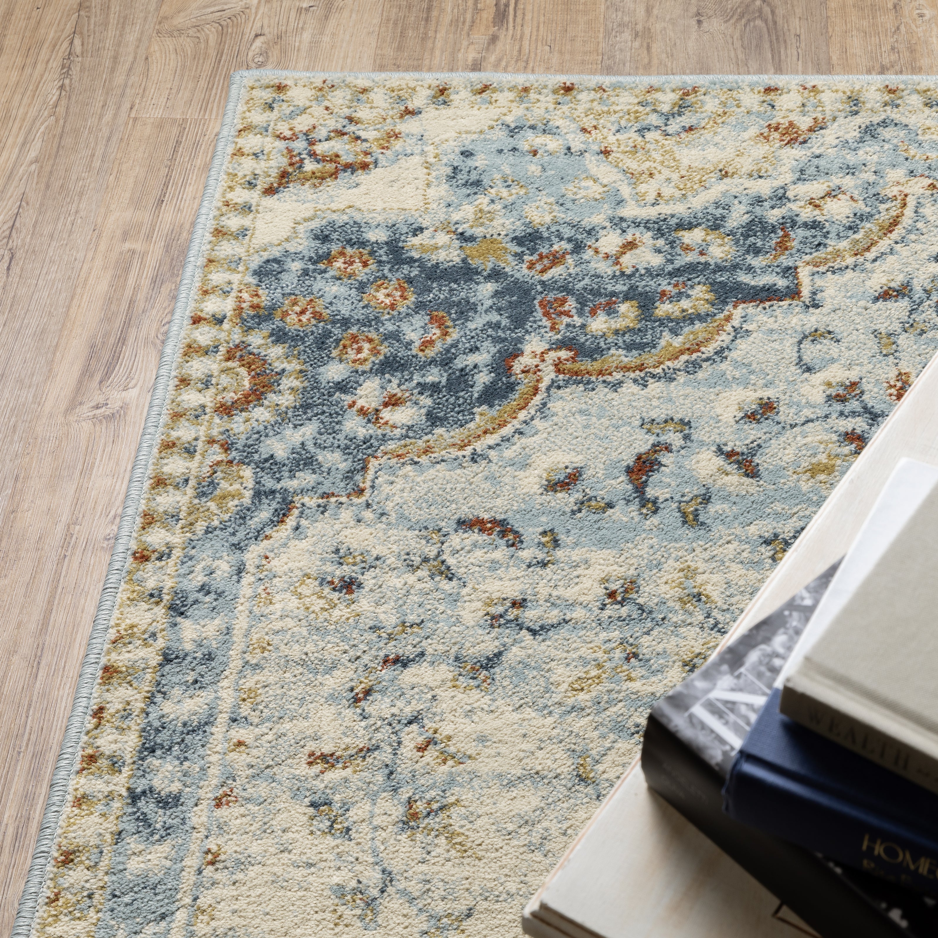 Oriental Weavers Branson BR01A soft transitional rug featuring textured design in blue/ multi tones
