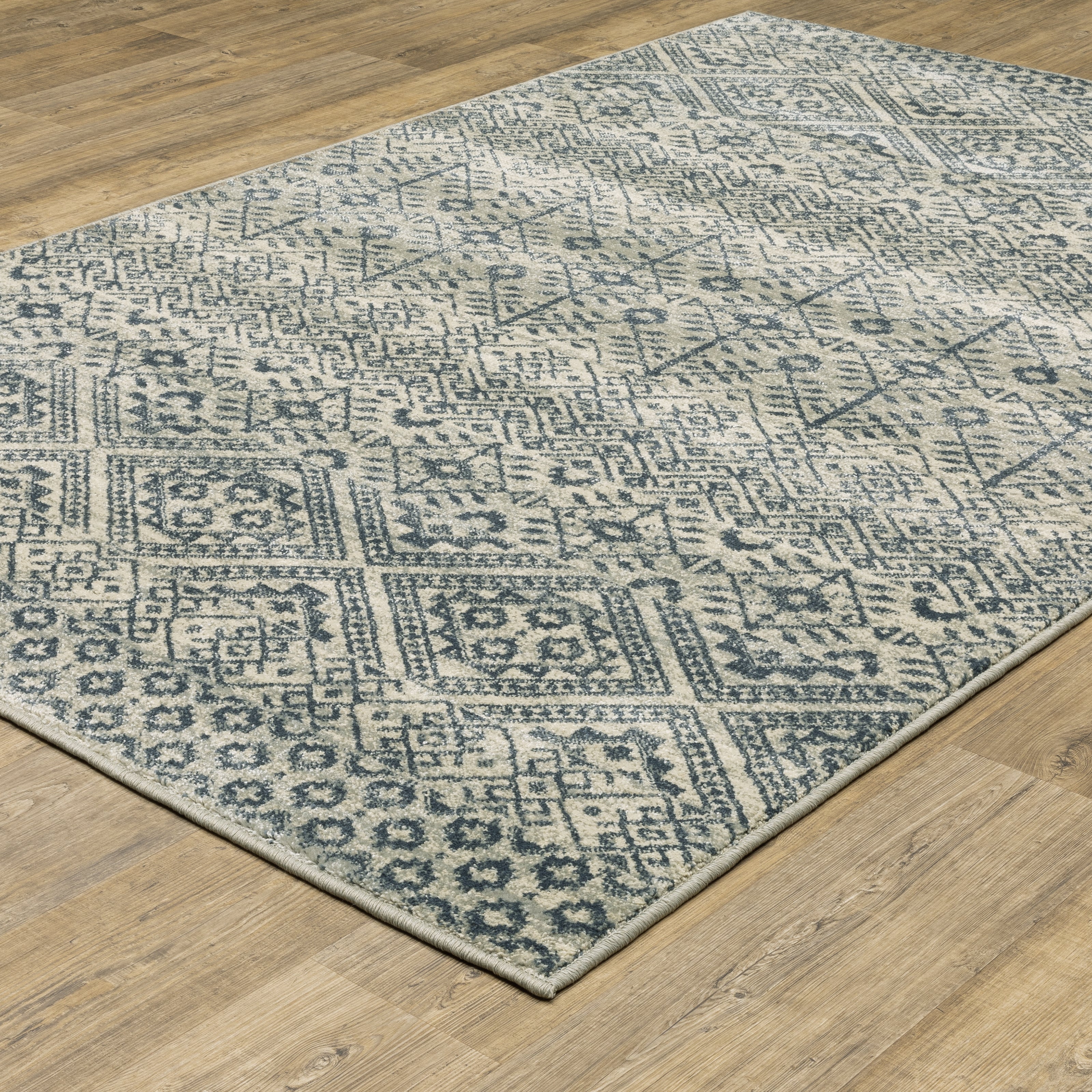 Oriental Weavers Branson BR02A soft transitional rug featuring textured design in blue/ beige tones