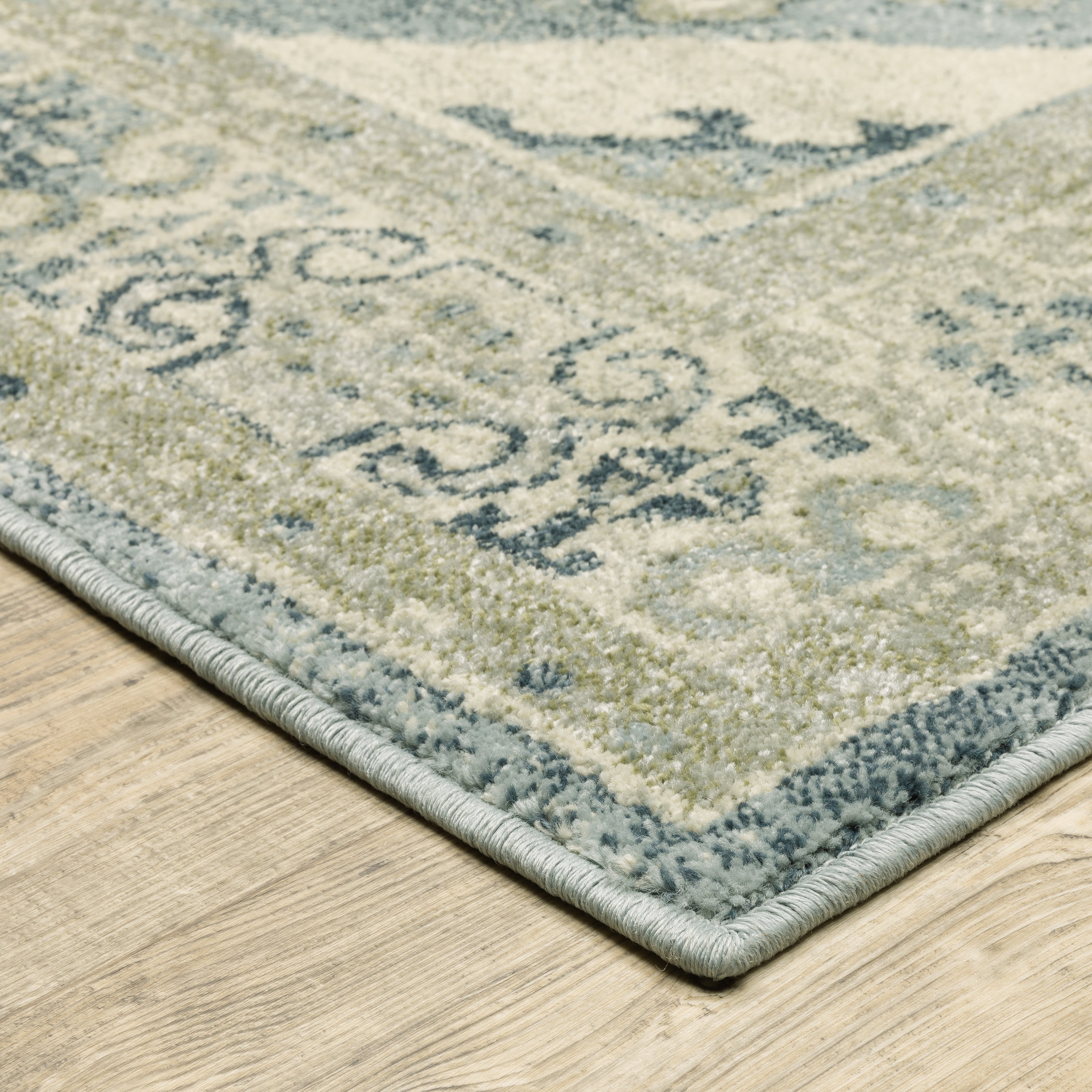 Oriental Weavers Branson BR03A soft transitional rug featuring textured design in blue/ grey tones