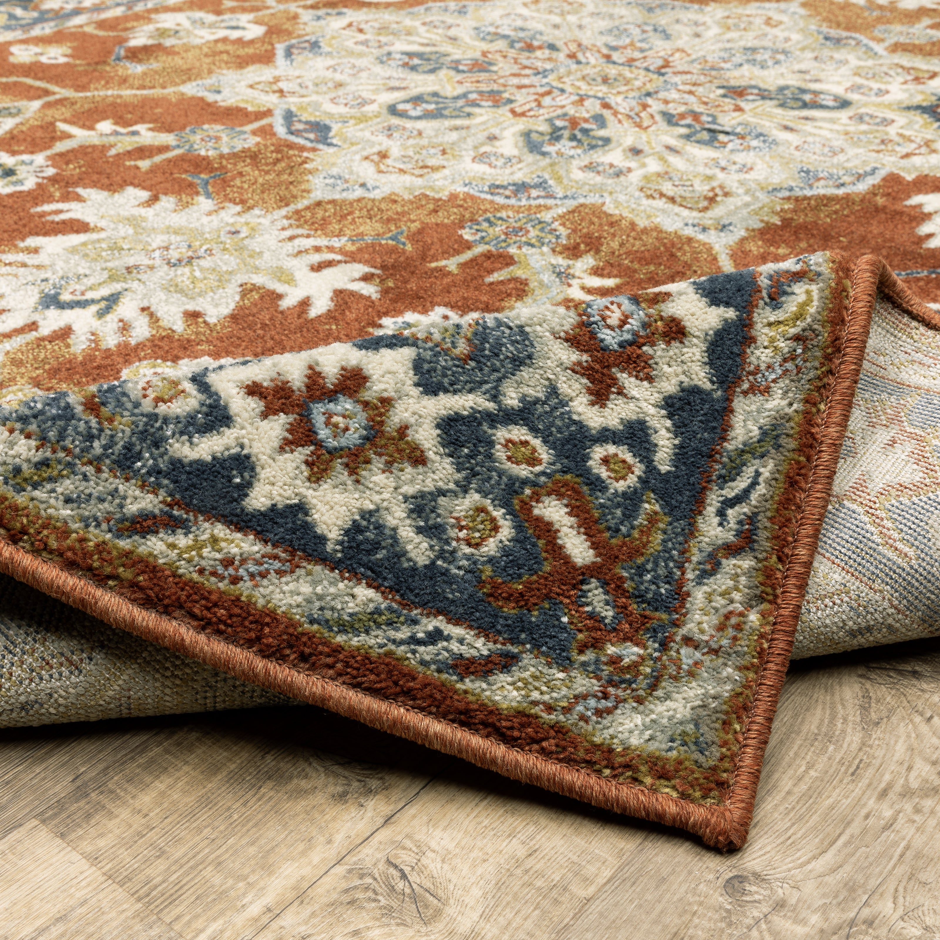Oriental Weavers Branson BR04A soft transitional rug featuring textured design in rust/ beige tones