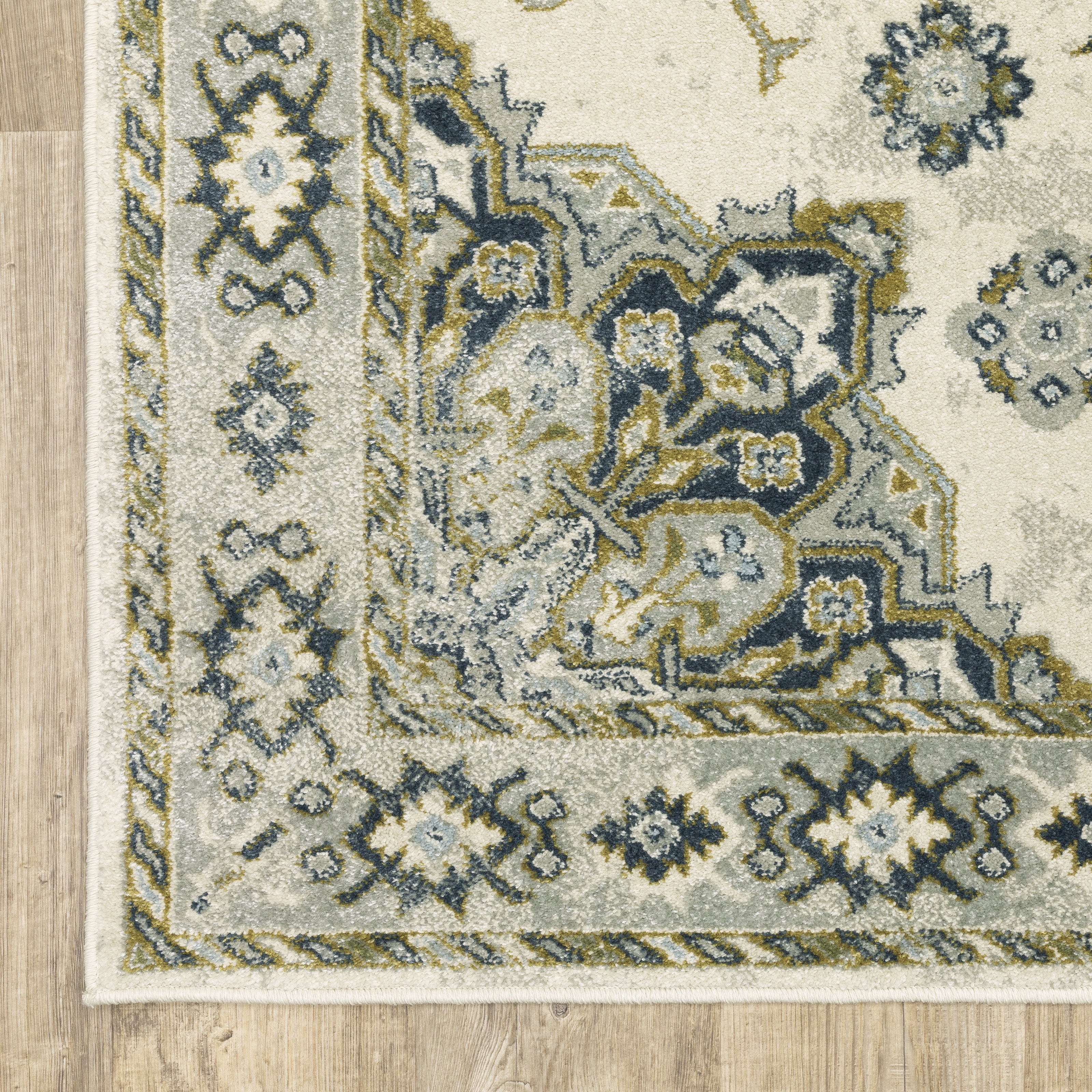 Oriental Weavers Branson BR04B soft transitional rug featuring textured design in ivory/ blue tones