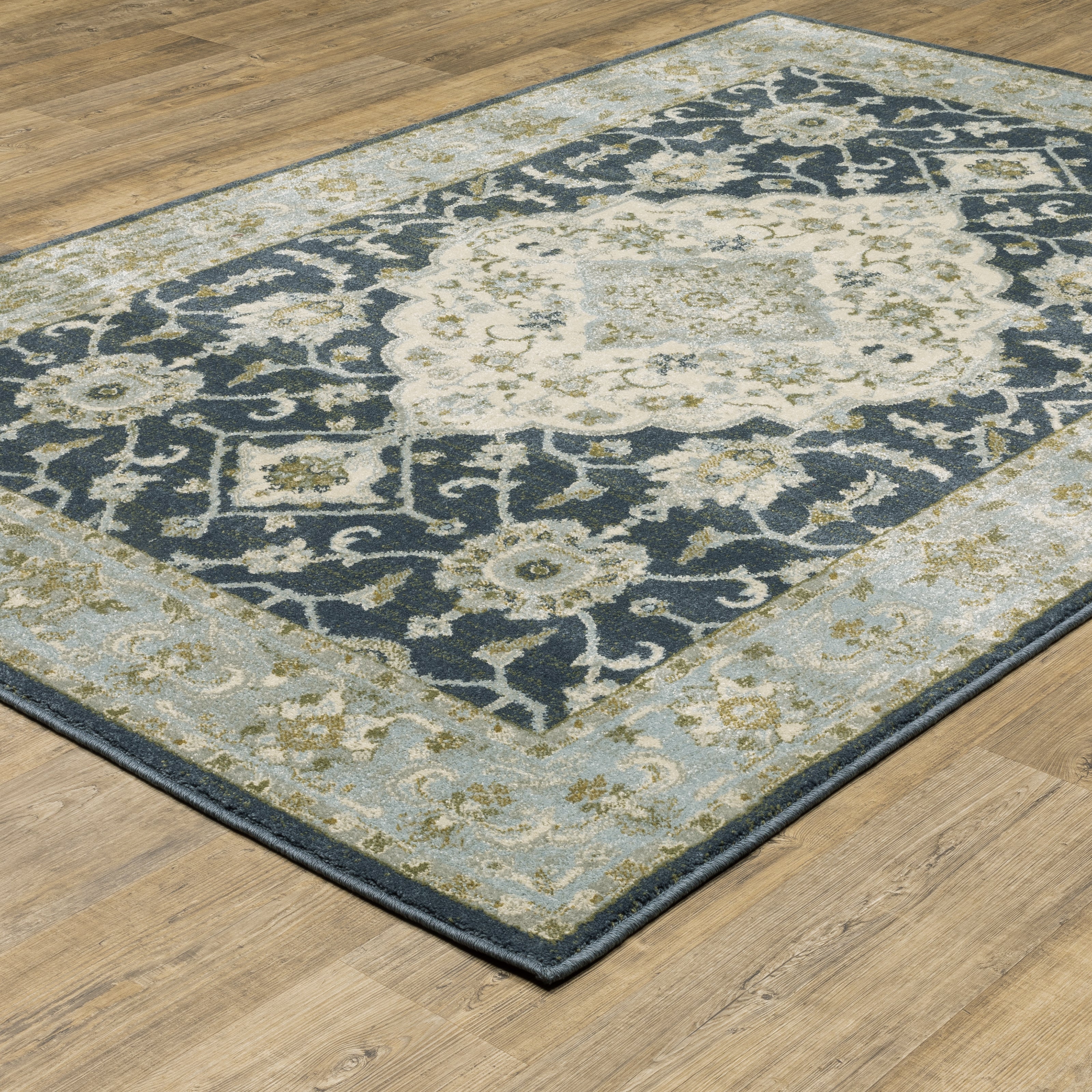 Oriental Weavers Branson BR05A soft transitional rug featuring textured design in teal blue/ ivory tones
