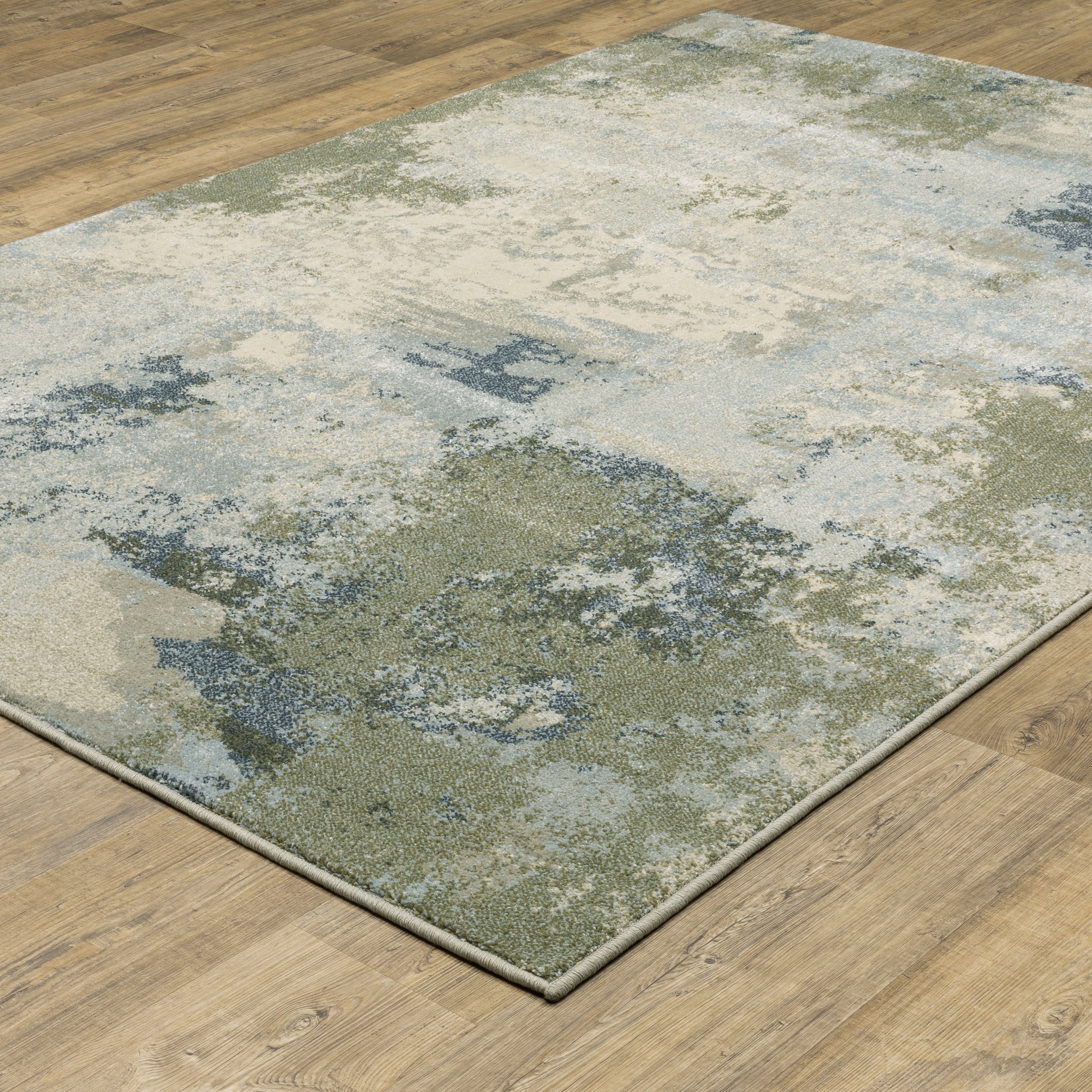 Oriental Weavers Branson BR08A soft transitional rug featuring textured design in blue/ green tones