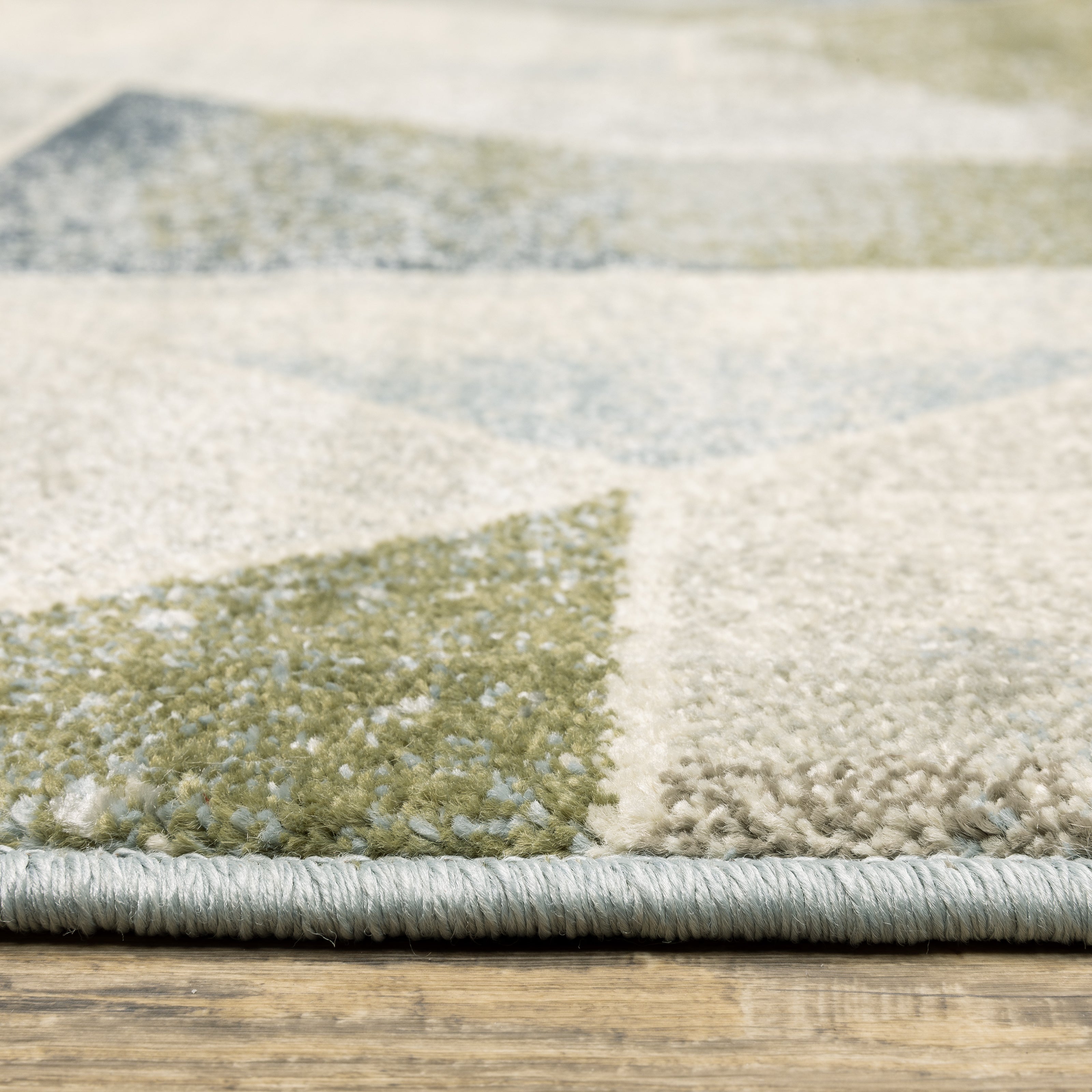 Oriental Weavers Branson BR10A soft transitional rug featuring textured design in blue/ green tones
