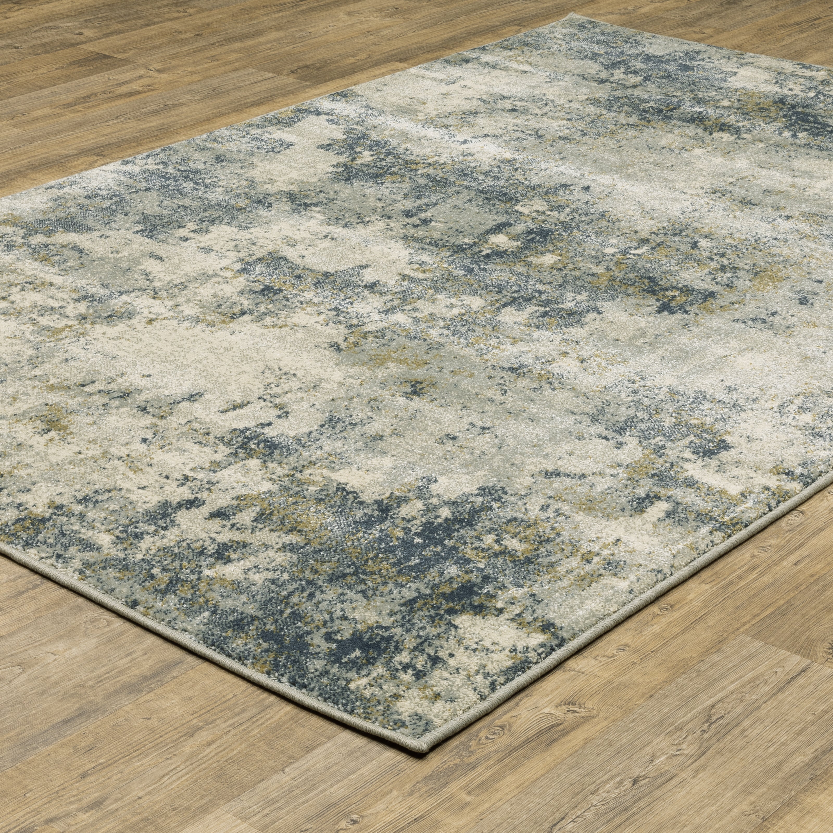 Oriental Weavers Branson BR12A soft transitional rug featuring textured design in beige/ teal tones