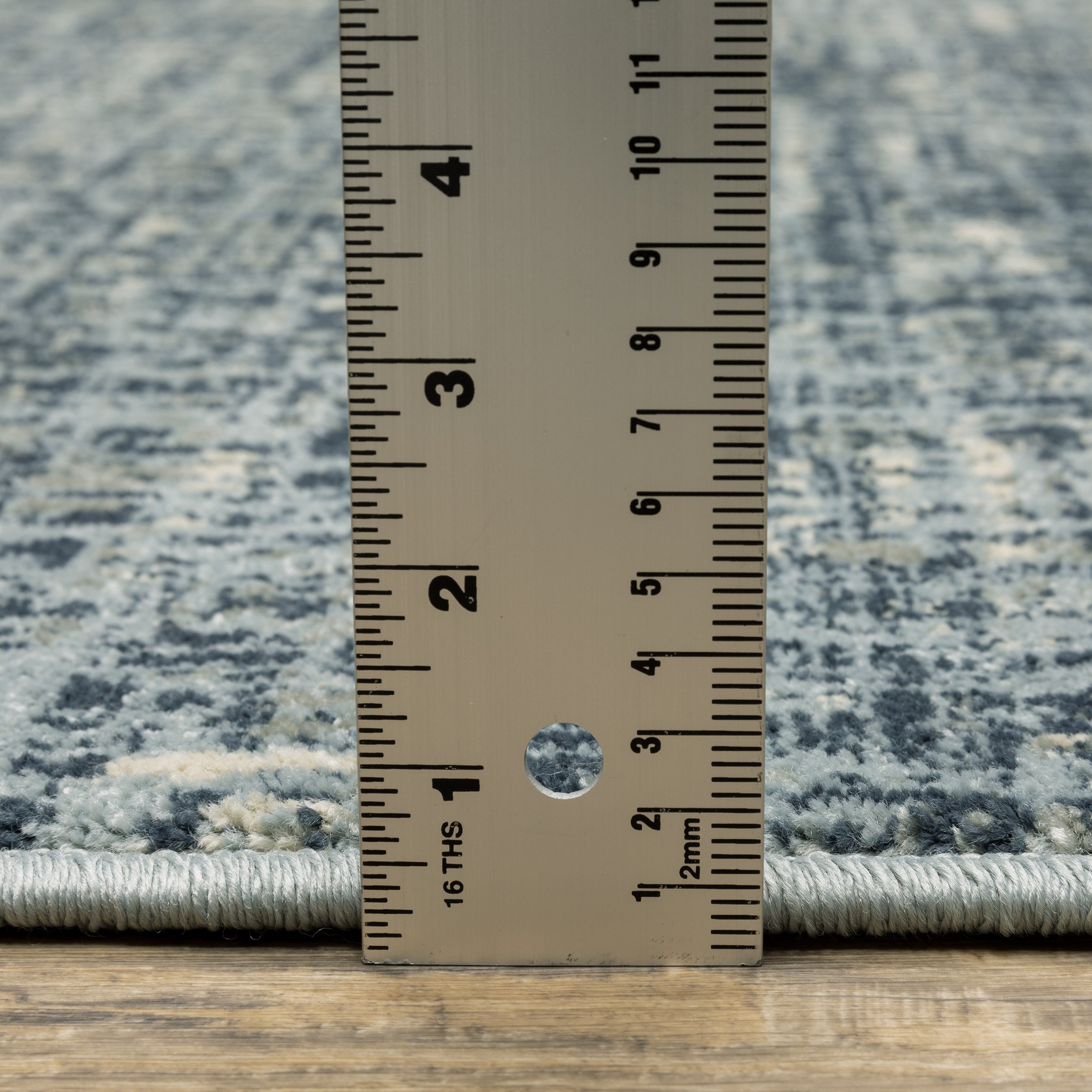 Oriental Weavers Branson BR13A soft transitional rug featuring textured design in blue/ grey tones