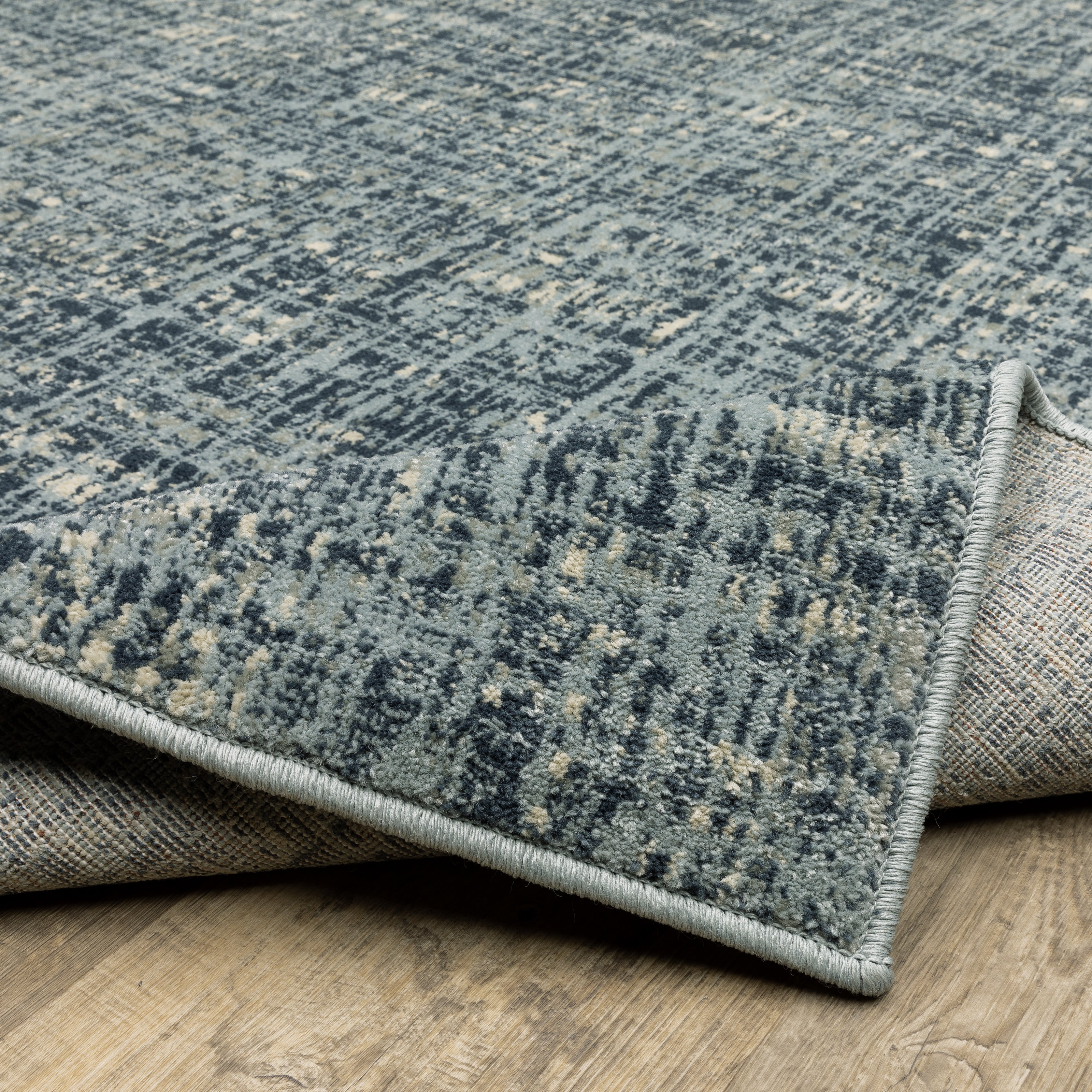 Oriental Weavers Branson BR13A soft transitional rug featuring textured design in blue/ grey tones