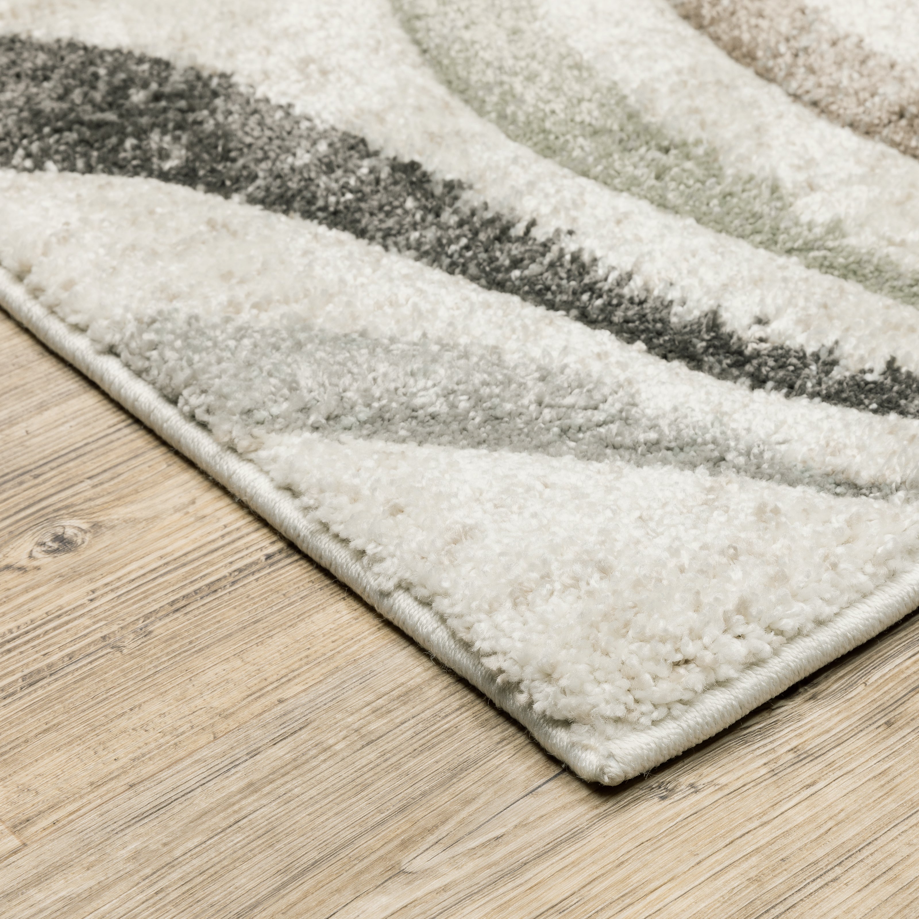 Oriental Weavers Cambria 162W2 plush modern rug featuring abstract pattern in beige/ multi tones