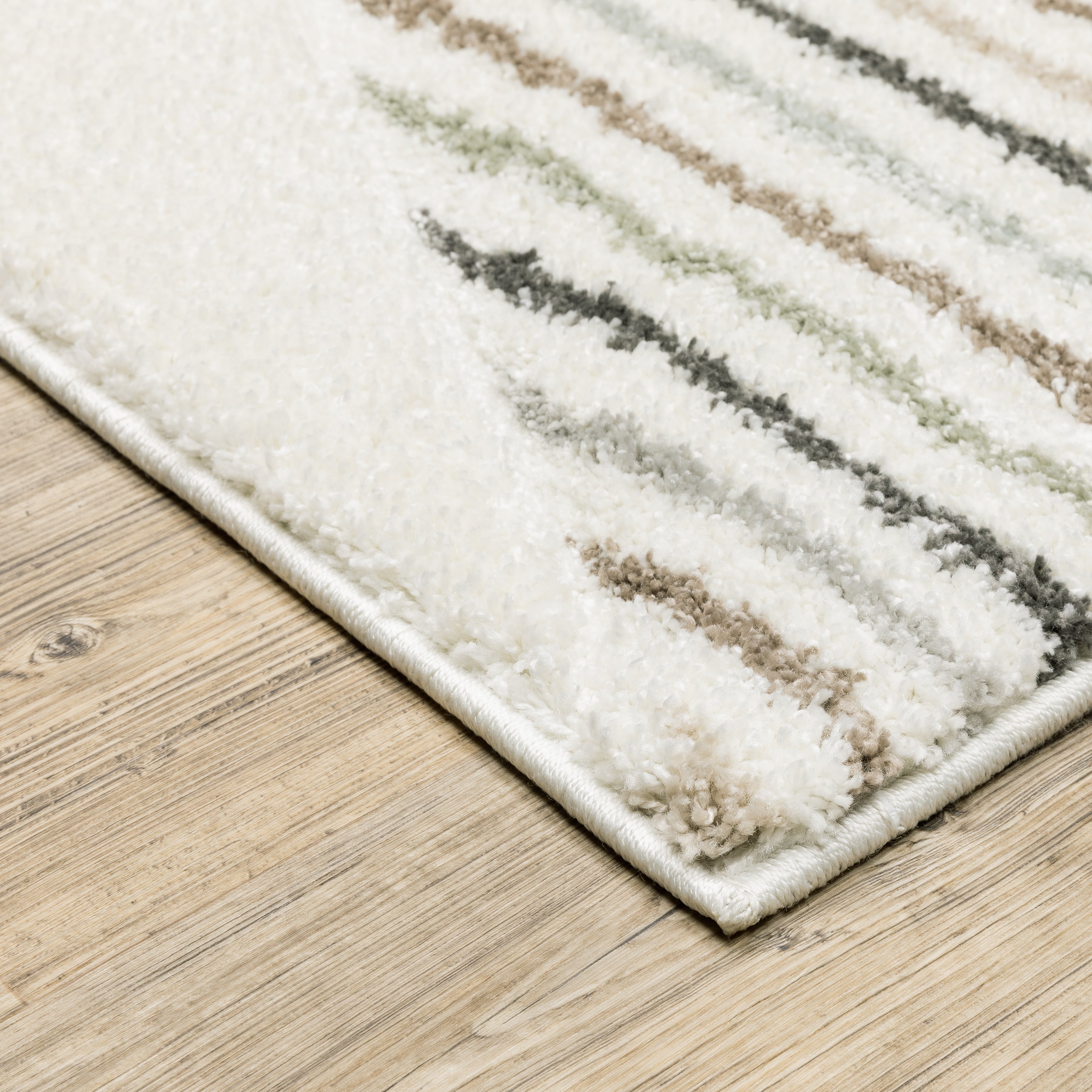 Oriental Weavers Cambria 4927C plush modern rug featuring abstract pattern in beige/ multi tones