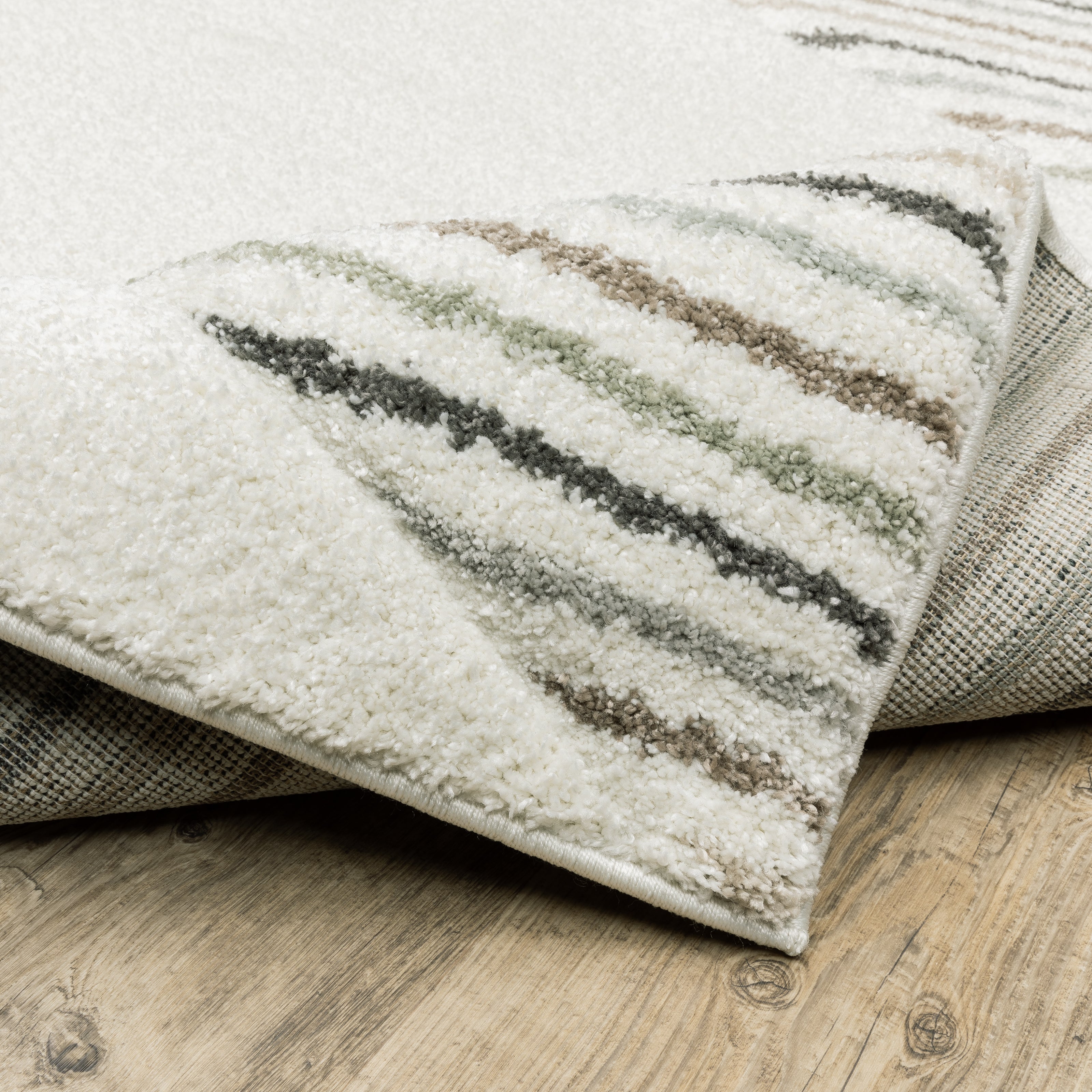 Oriental Weavers Cambria 4927C plush modern rug featuring abstract pattern in beige/ multi tones