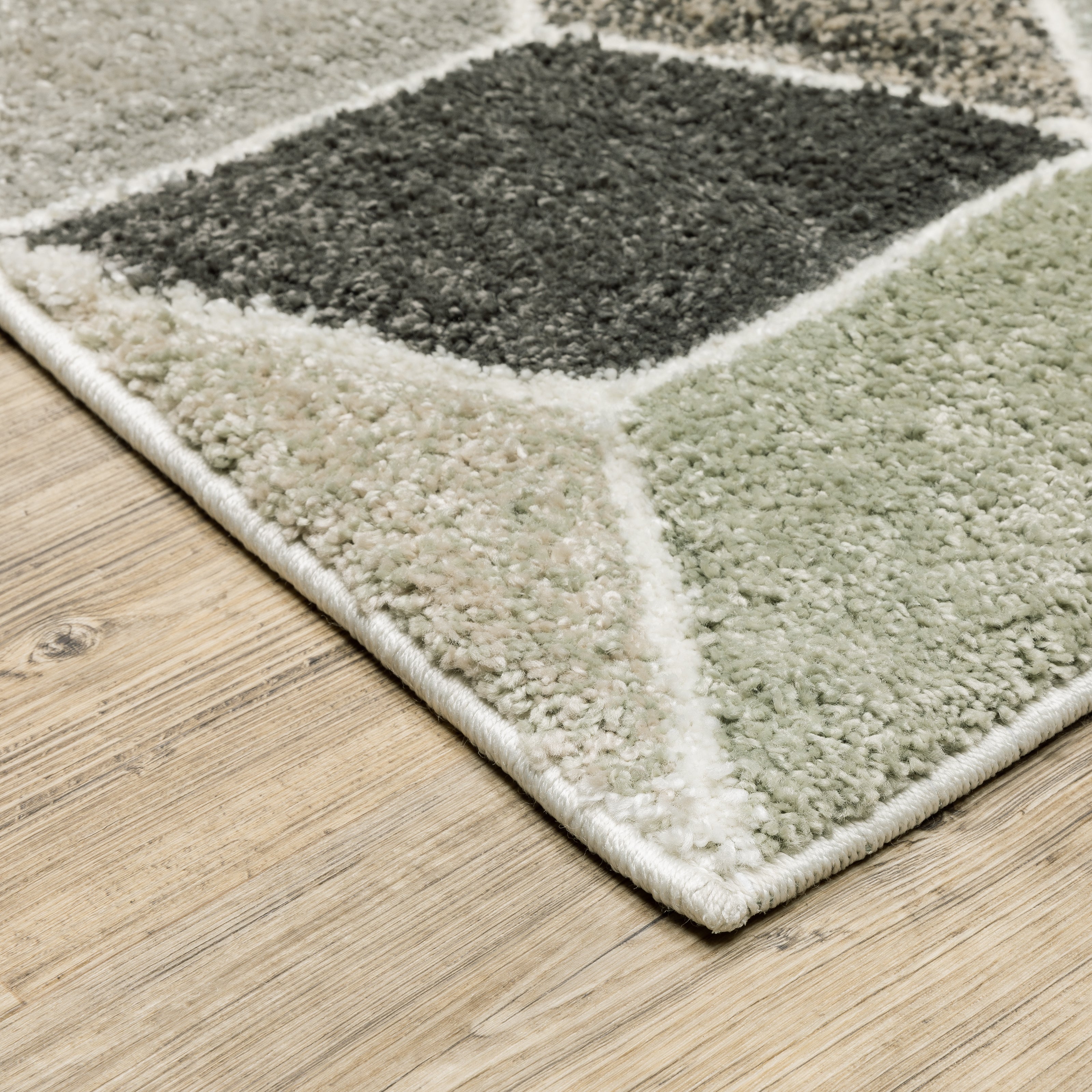 Oriental Weavers Cambria 083J2 plush modern rug featuring abstract pattern in beige/ multi tones